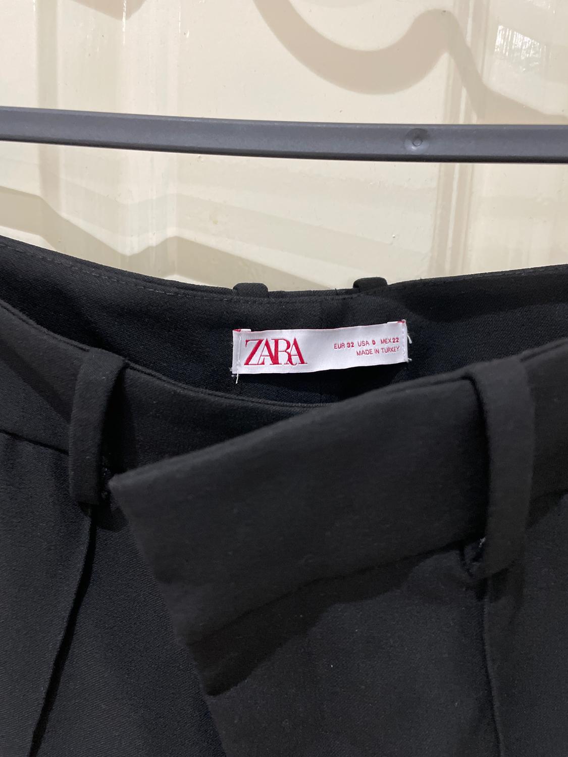 TROUSERS WITH ZIPS - Image 3
