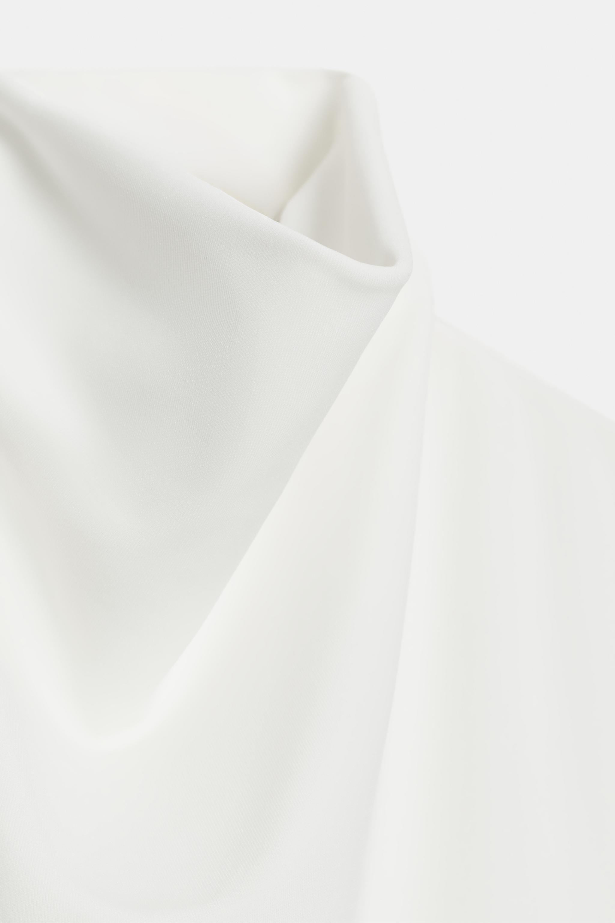 ASYMMETRIC FLOWY TOP
