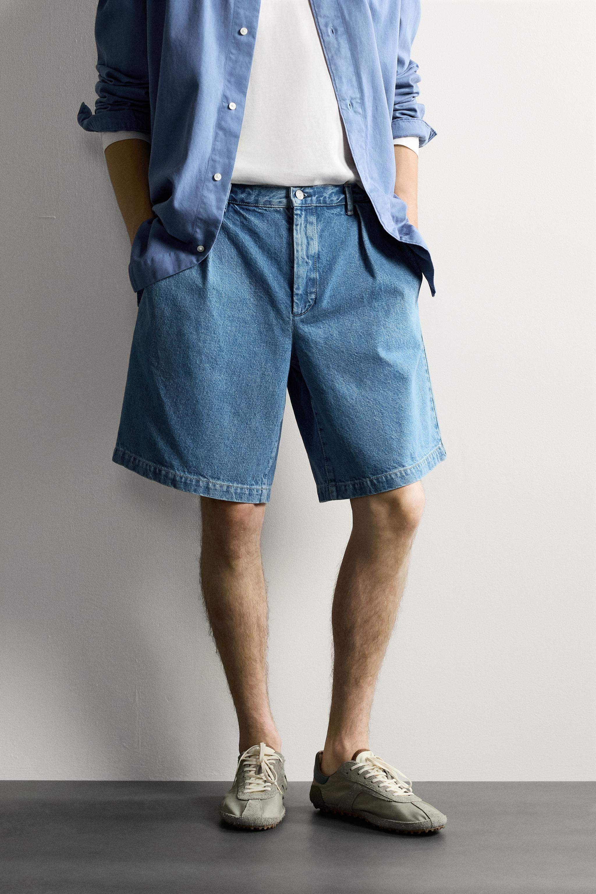 RELAXED FIT PLEATED DENIM CHINO SHORTS — Blue