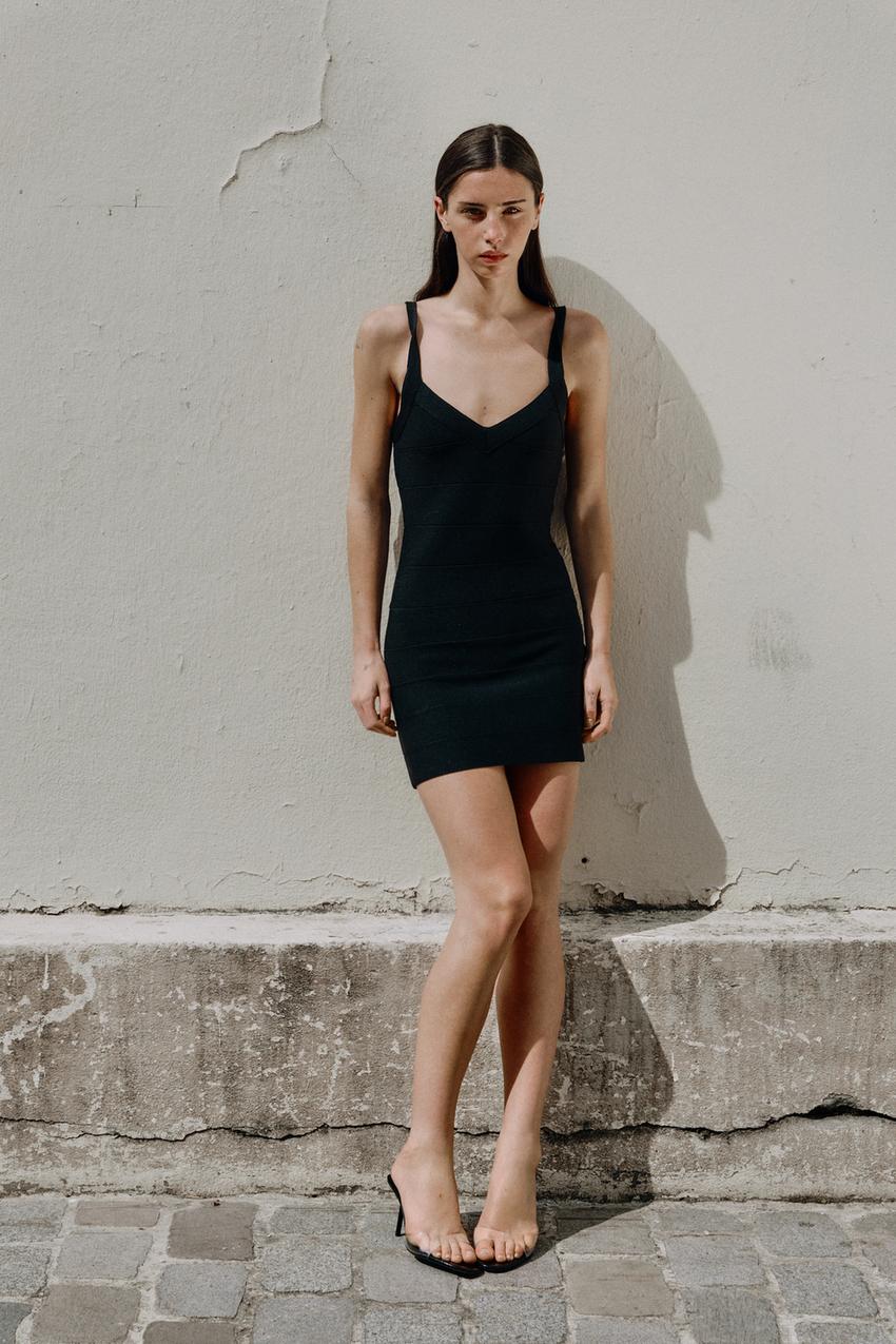 black stretch dress Beyond Yoga Score Pleated This off shoulder midi cocktail dress features a clean and structured silhouette designed for formal and semi formal occasions Bliss Bow Dress, in Black