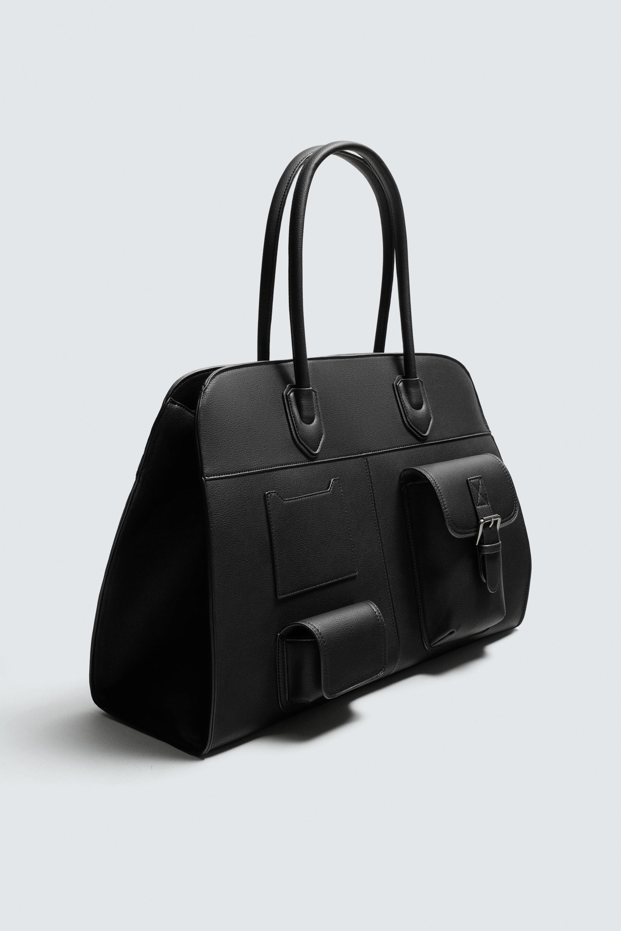 MULTI-POCKET TRAVEL BAG