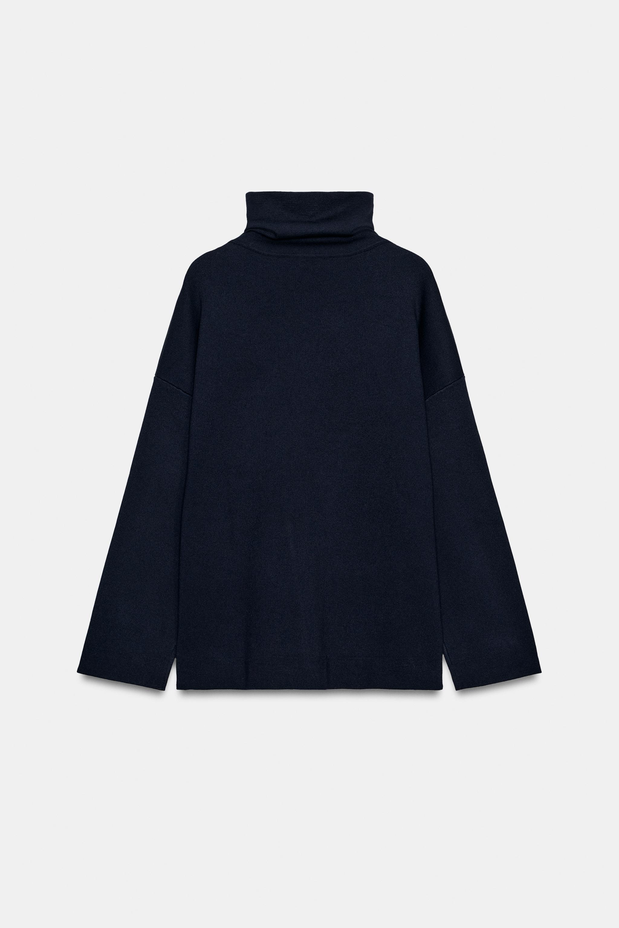 PULL EN MAILLE À COL MONTANT