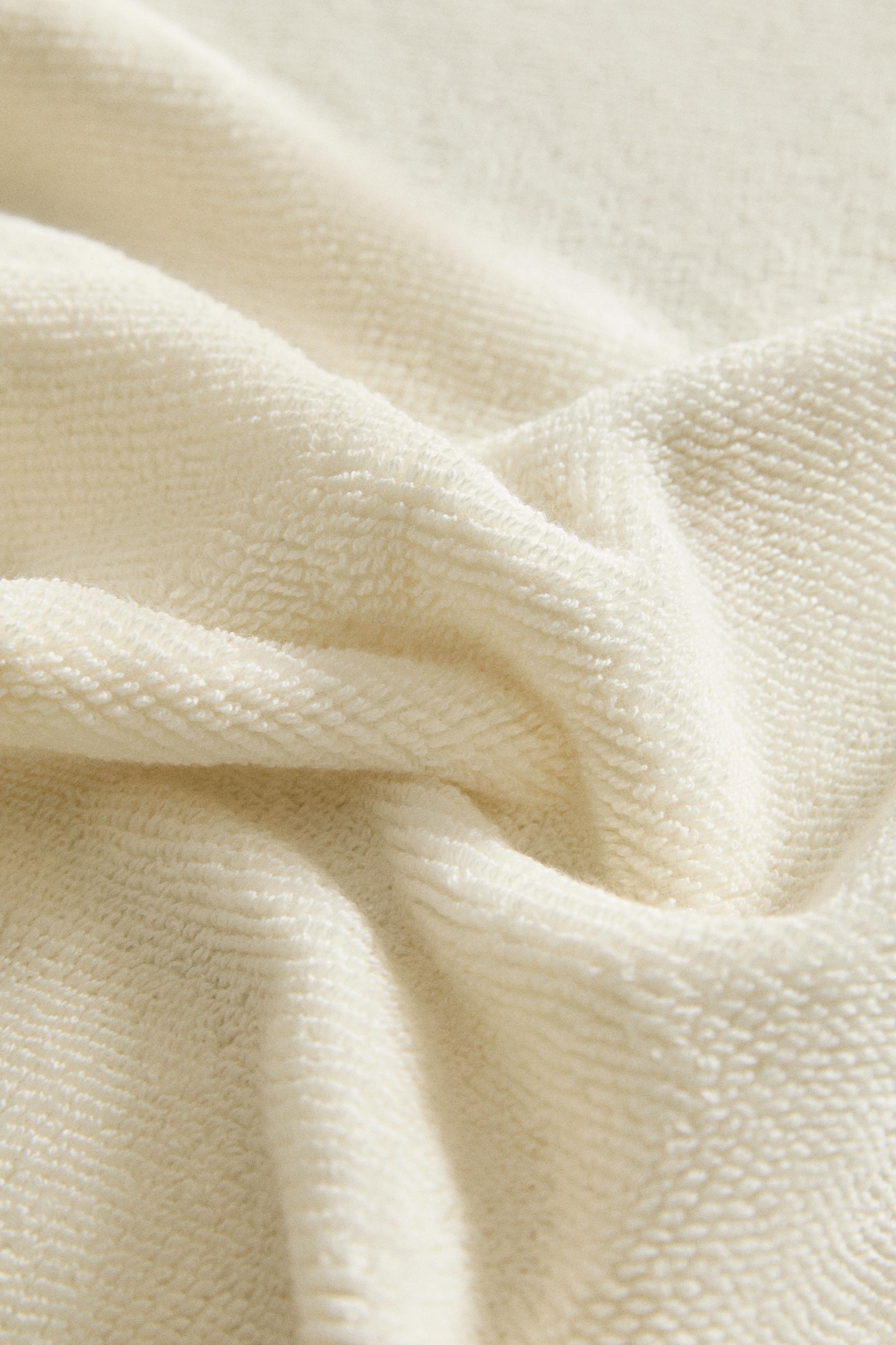 RICE STITCH BATH TOWEL WITH STRIPED EDGE
