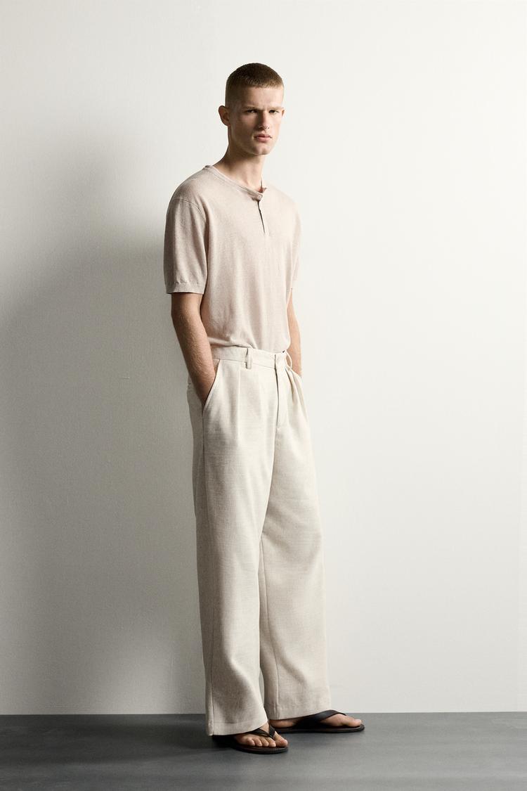 PANTALÓN CON PLIEGUES RELAXED FIT TEXTURIZADO 4