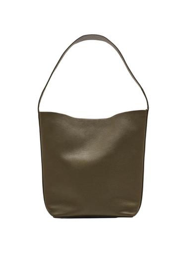 Minimalist khaki green shoulder bag with a grained texture and single top handle, on a white background.