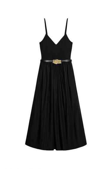 Front view of a black dress with spaghetti straps and a belt with a gold buckle.