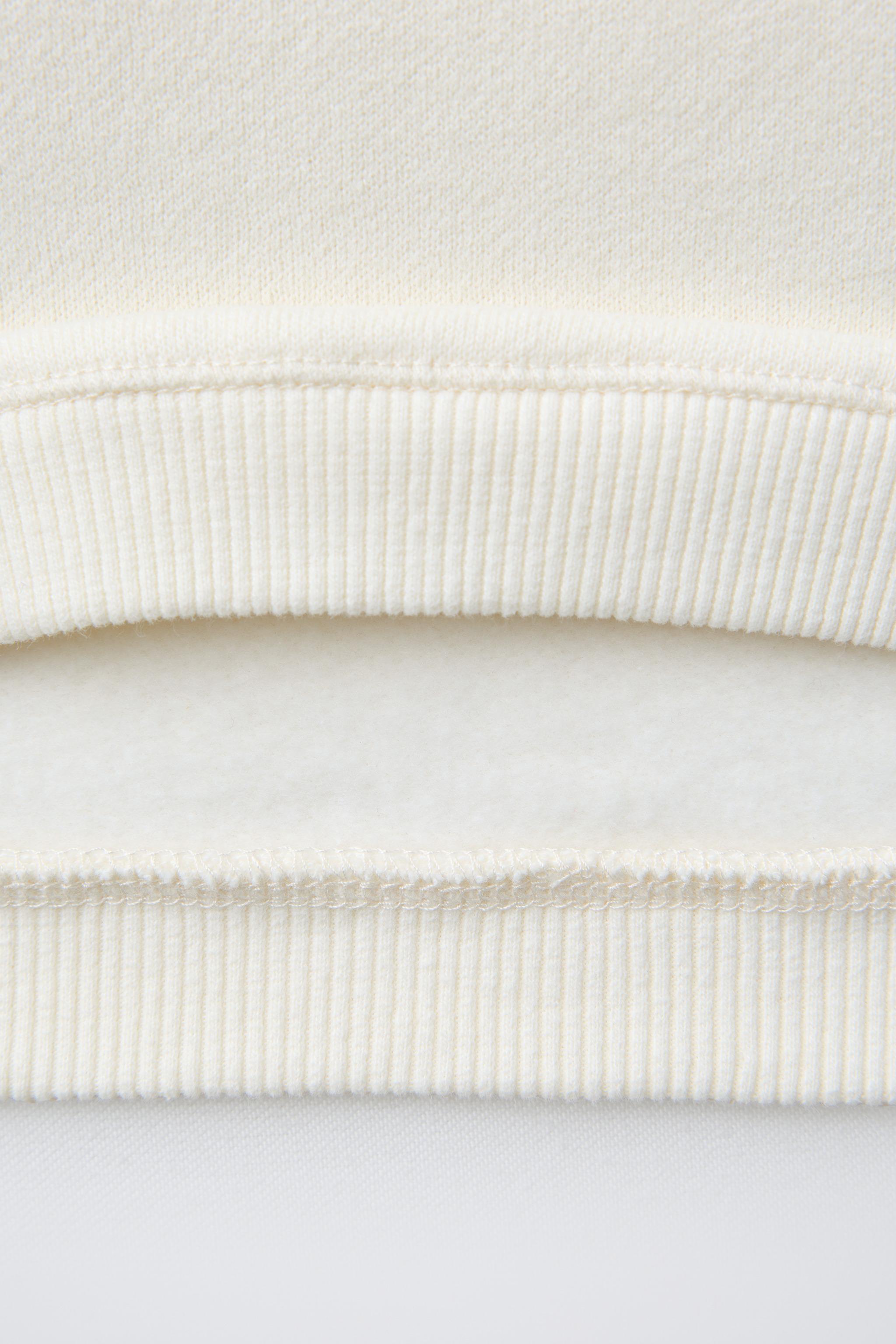 SNOOPY PEANUTS™ TERRY PATCH SWEATSHIRT