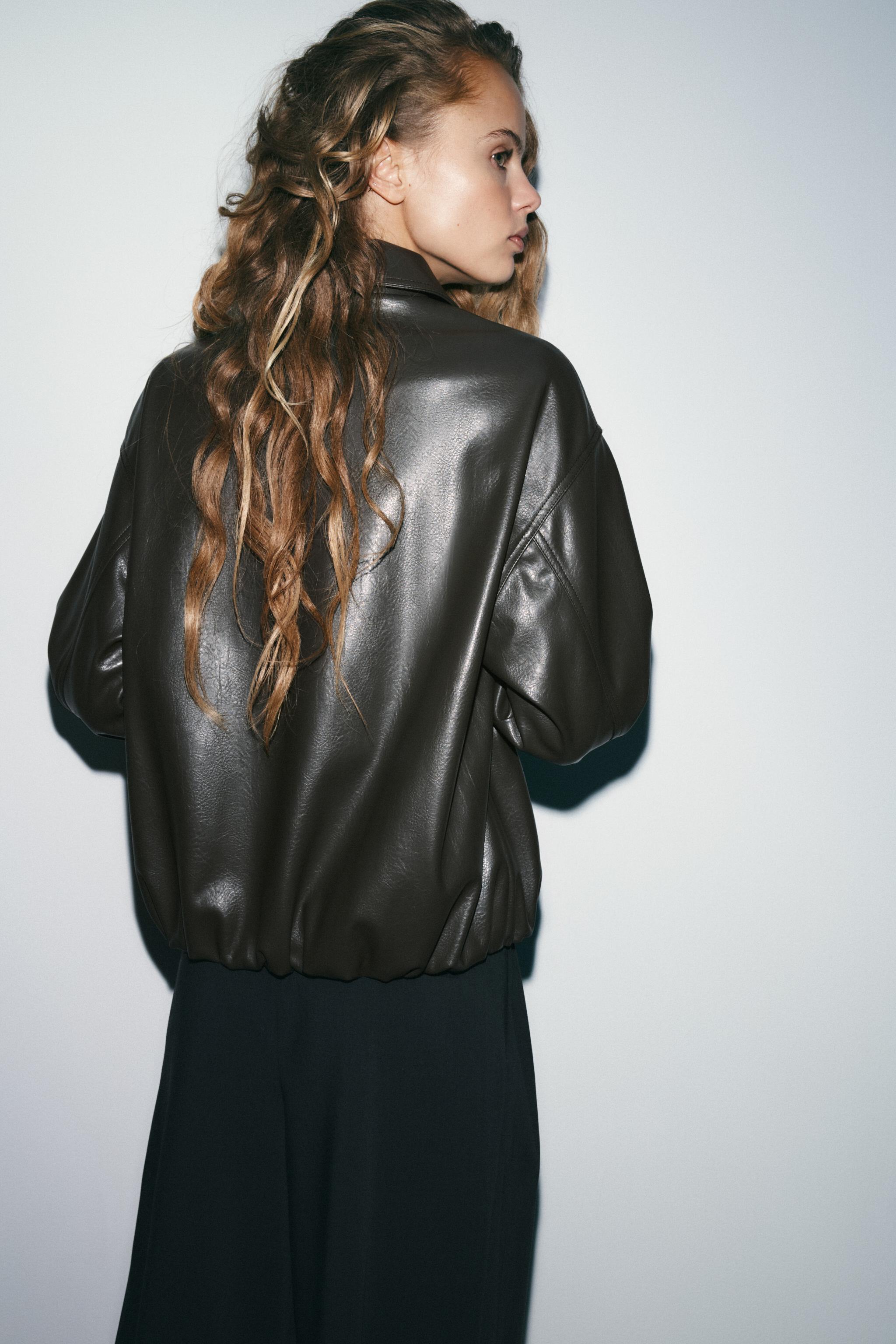 LEATHER EFFECT JACKET WITH ELASTICATED DETAILS
