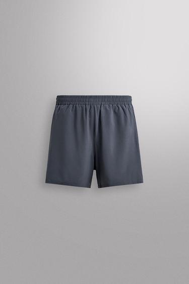 COMBINED PERFORATED SHORTS - Light blue by Zara