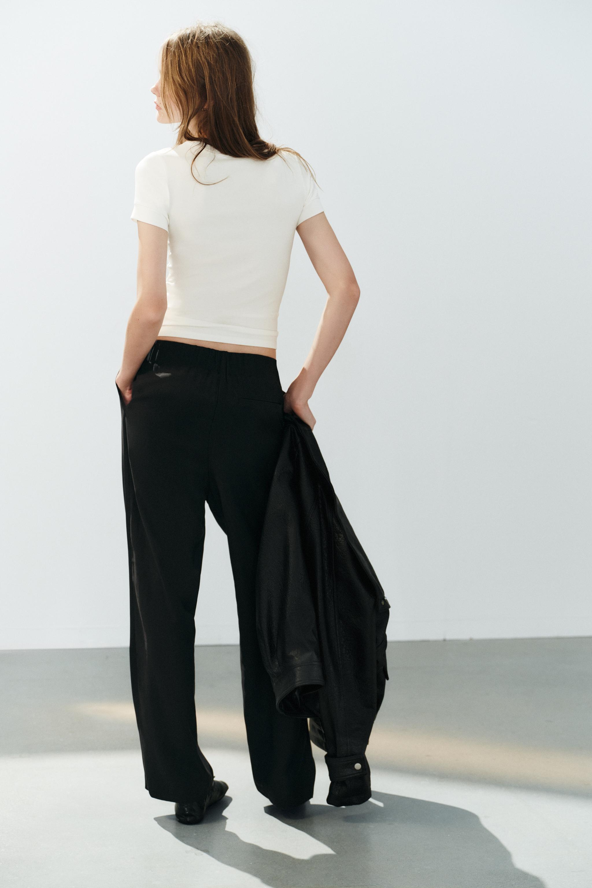 PLEATED FLOWY TROUSERS