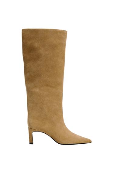 Side view of brown high boot with stiletto heel