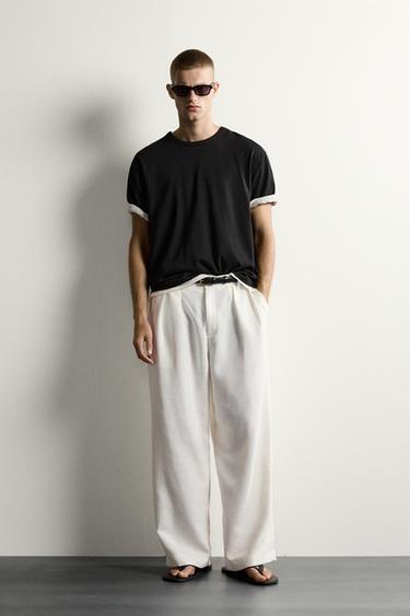 RELAXED FIT TEXTURED PLEATED TROUSERS - White by Zara