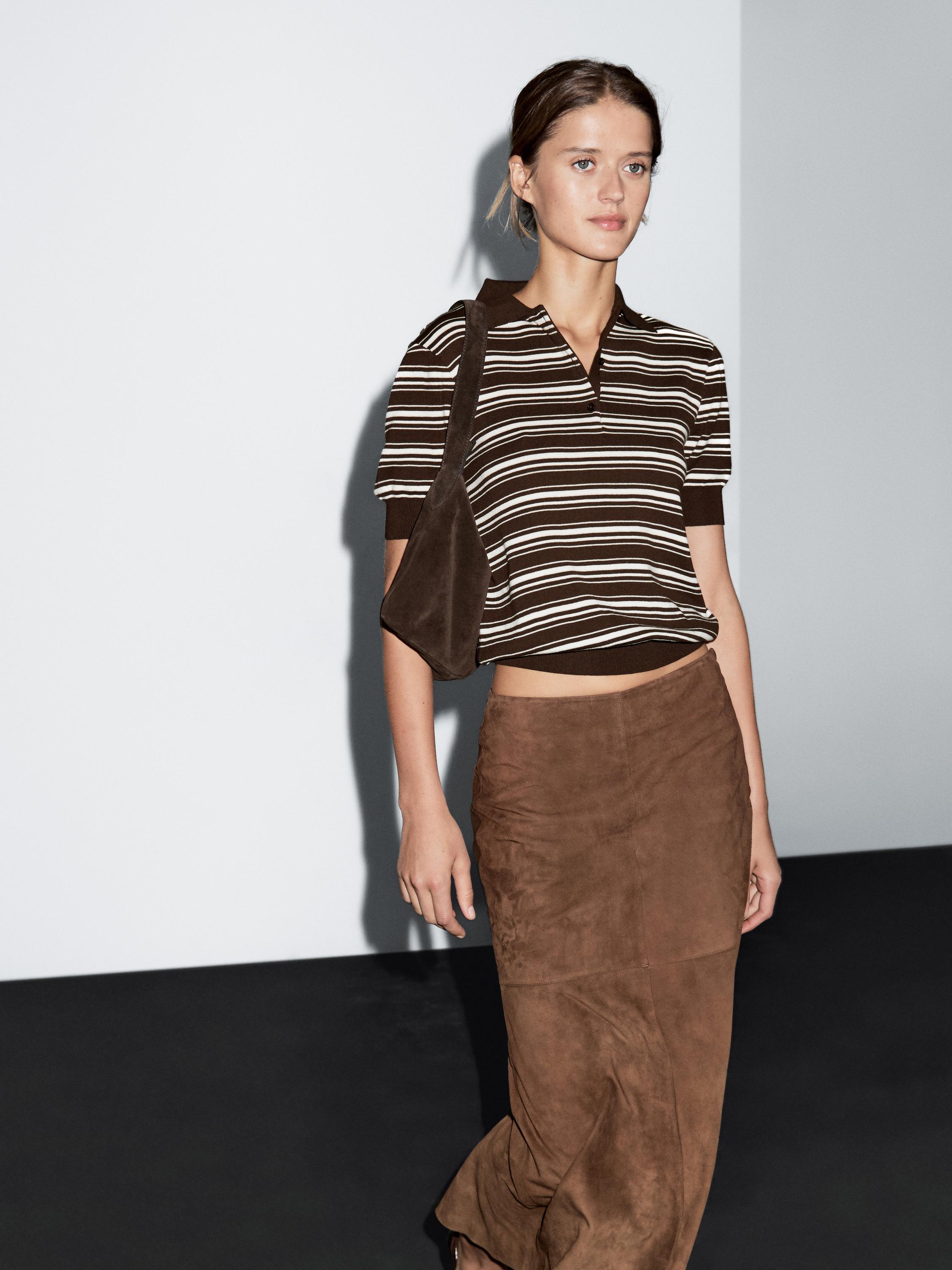 100% cotton polo shirt with striped details