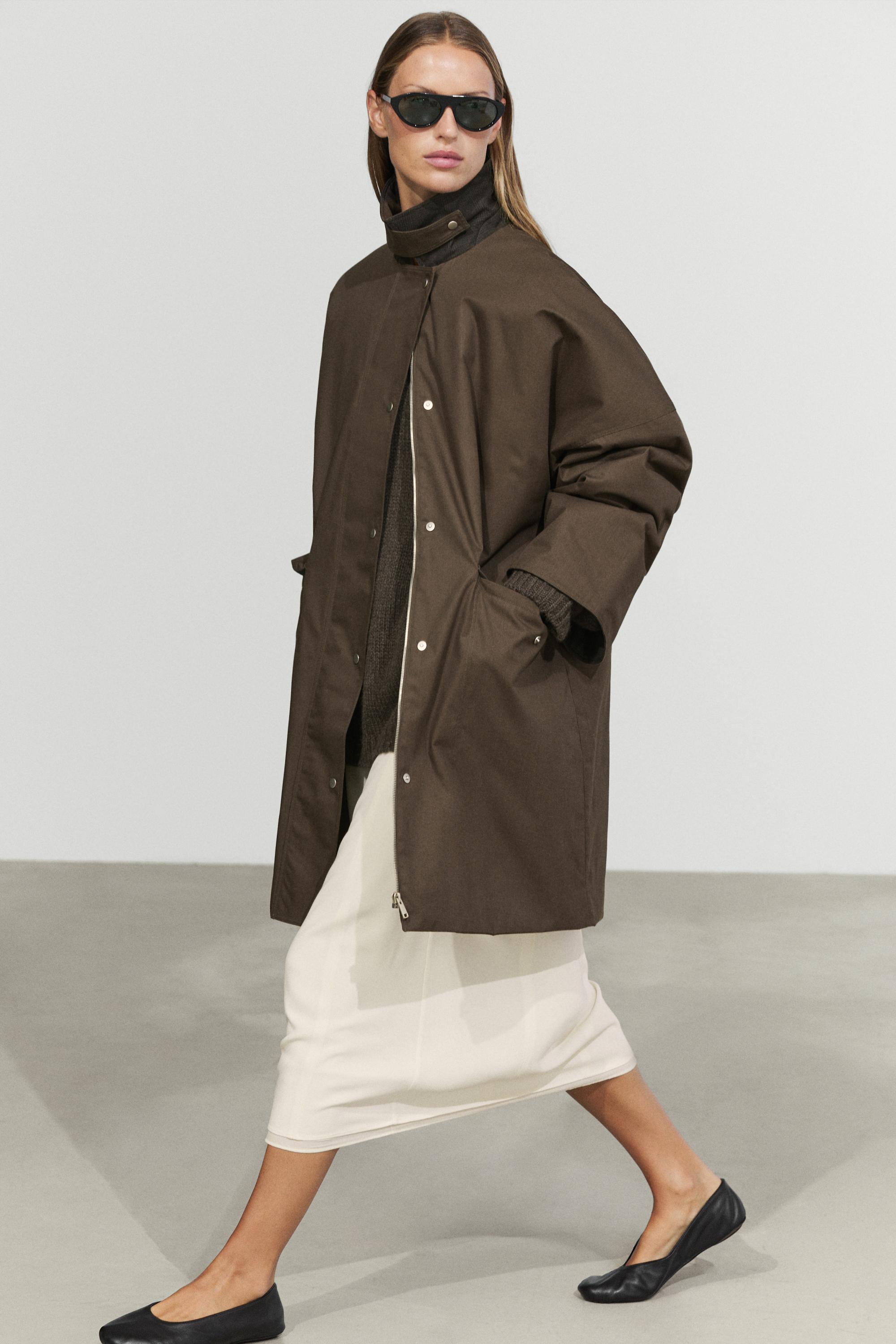 Waxed-effect parka with plaid lining