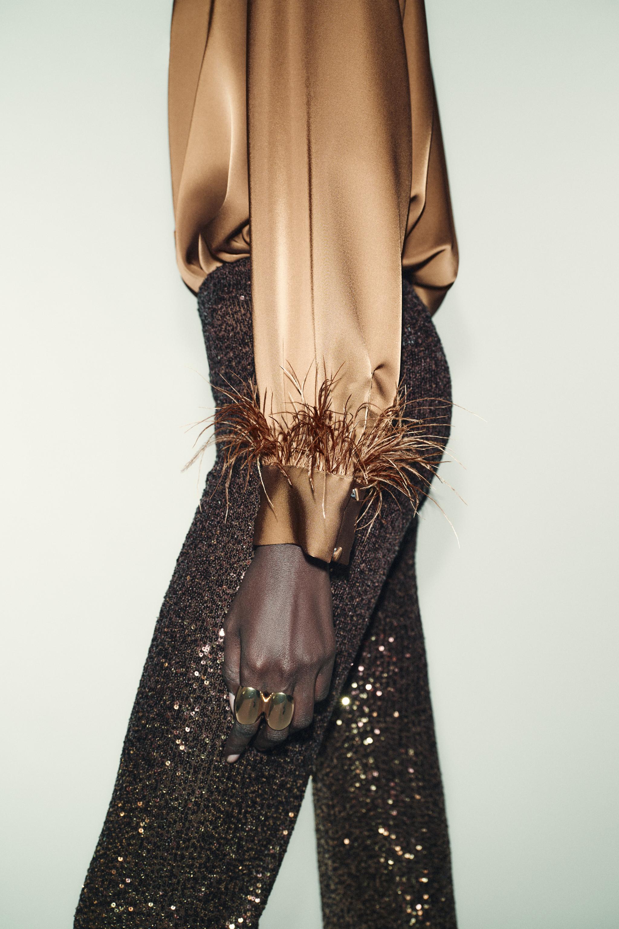 SATIN EFFECT FEATHER BLOUSE