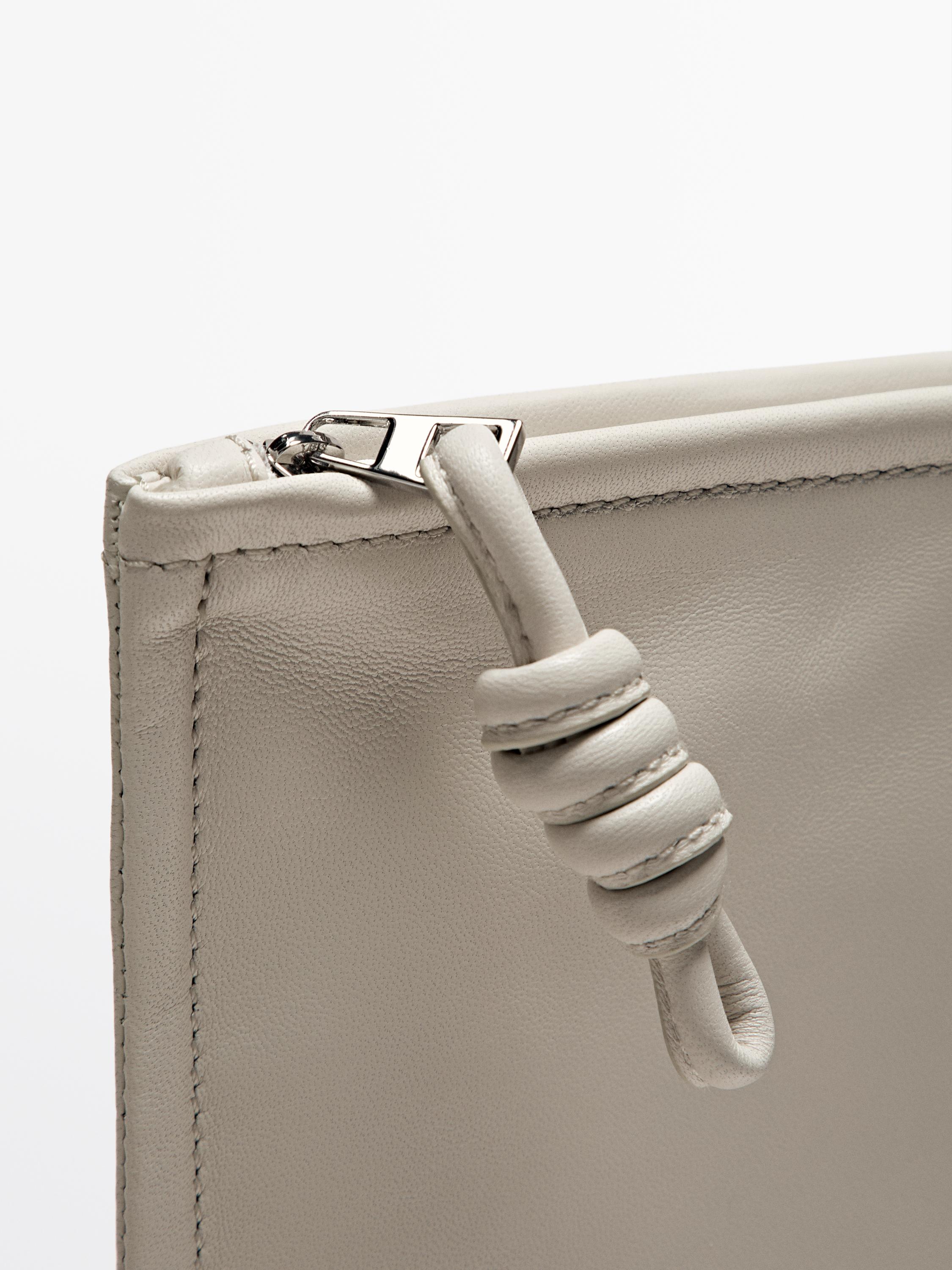 Petit sac pochette avec nœud en cuir nappa