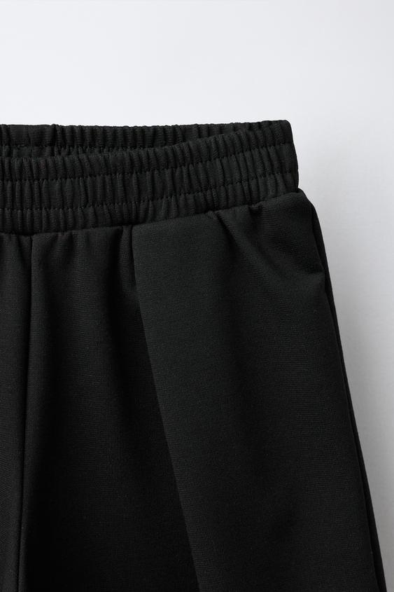 PANTALON LARGE PINCES INTERLOCK - Noir de Zara - Image 2