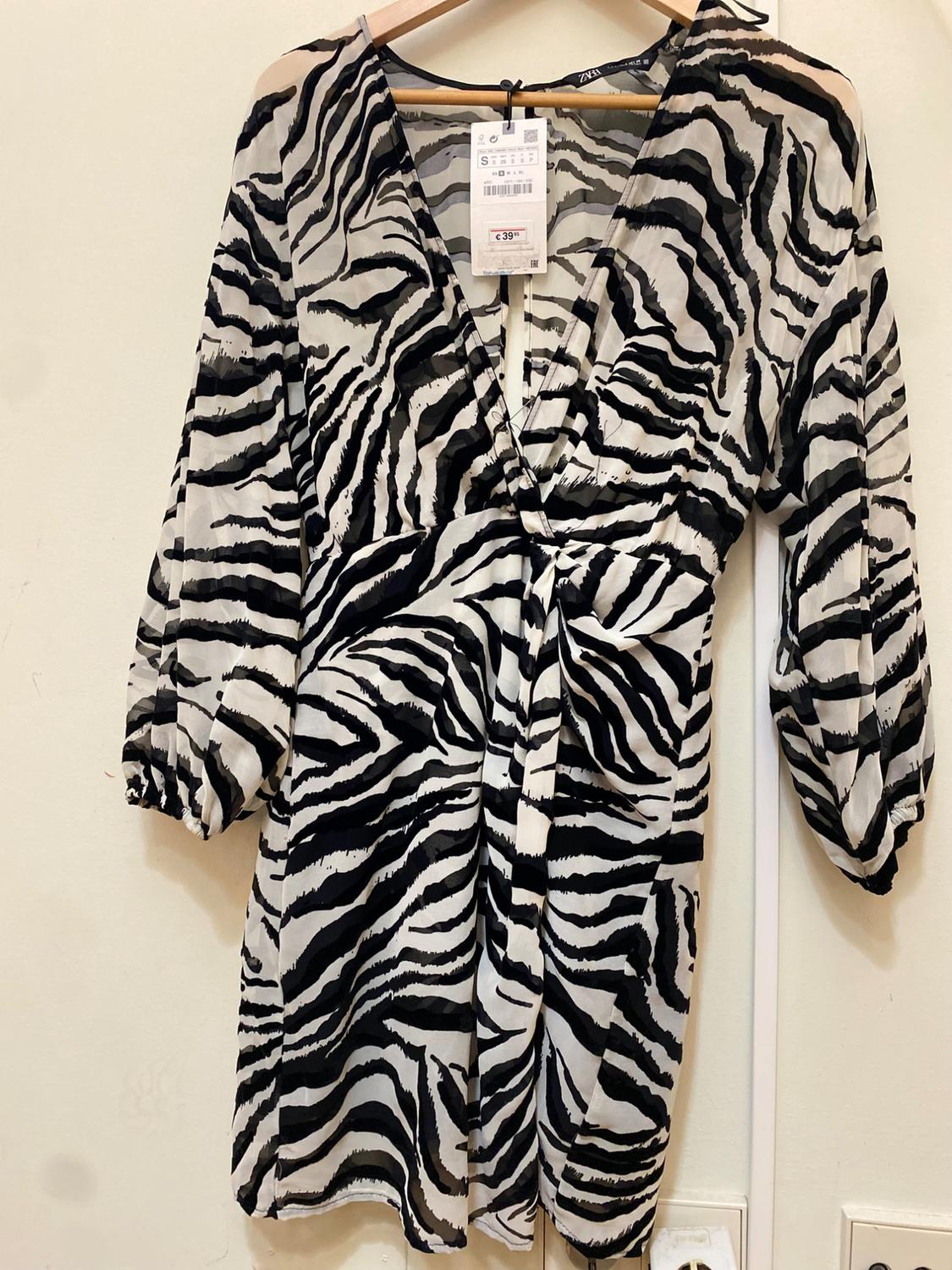 ANIMAL PRINT MINI DRESS