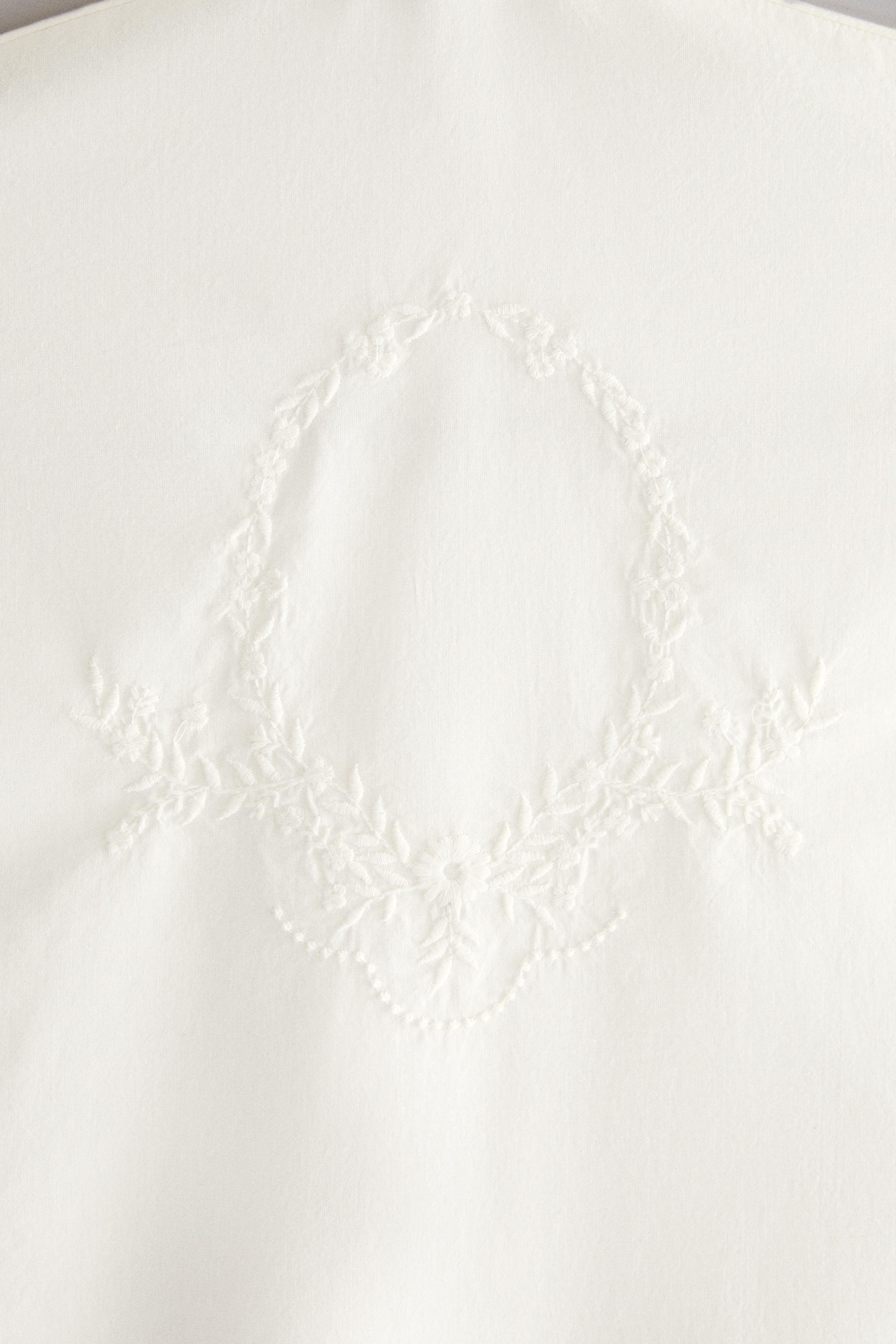 EMBROIDERED COTTON CLOTHING COVER — Ivory