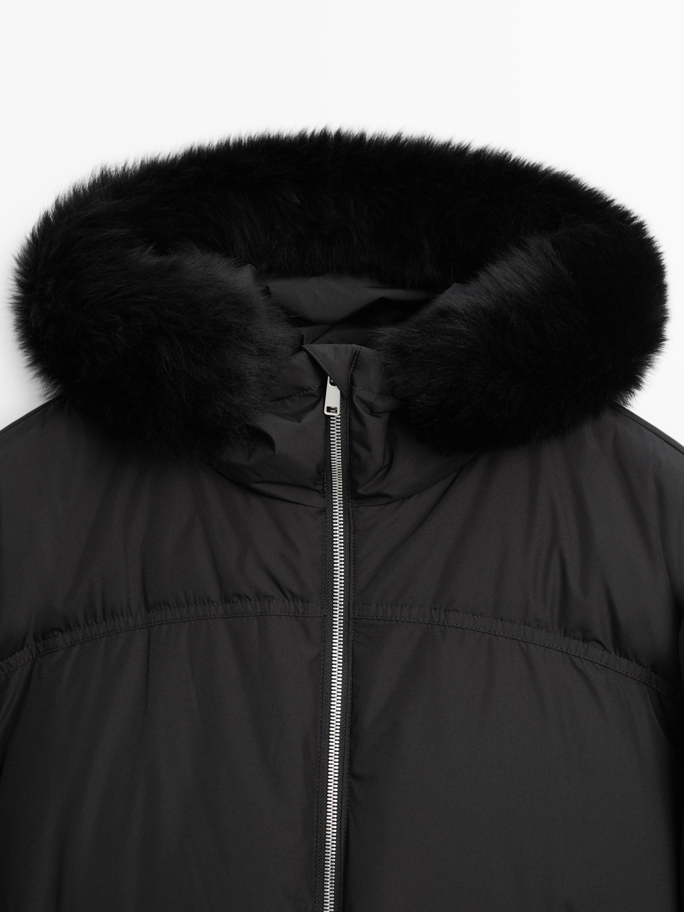 Technical down jacket with faux fur hood