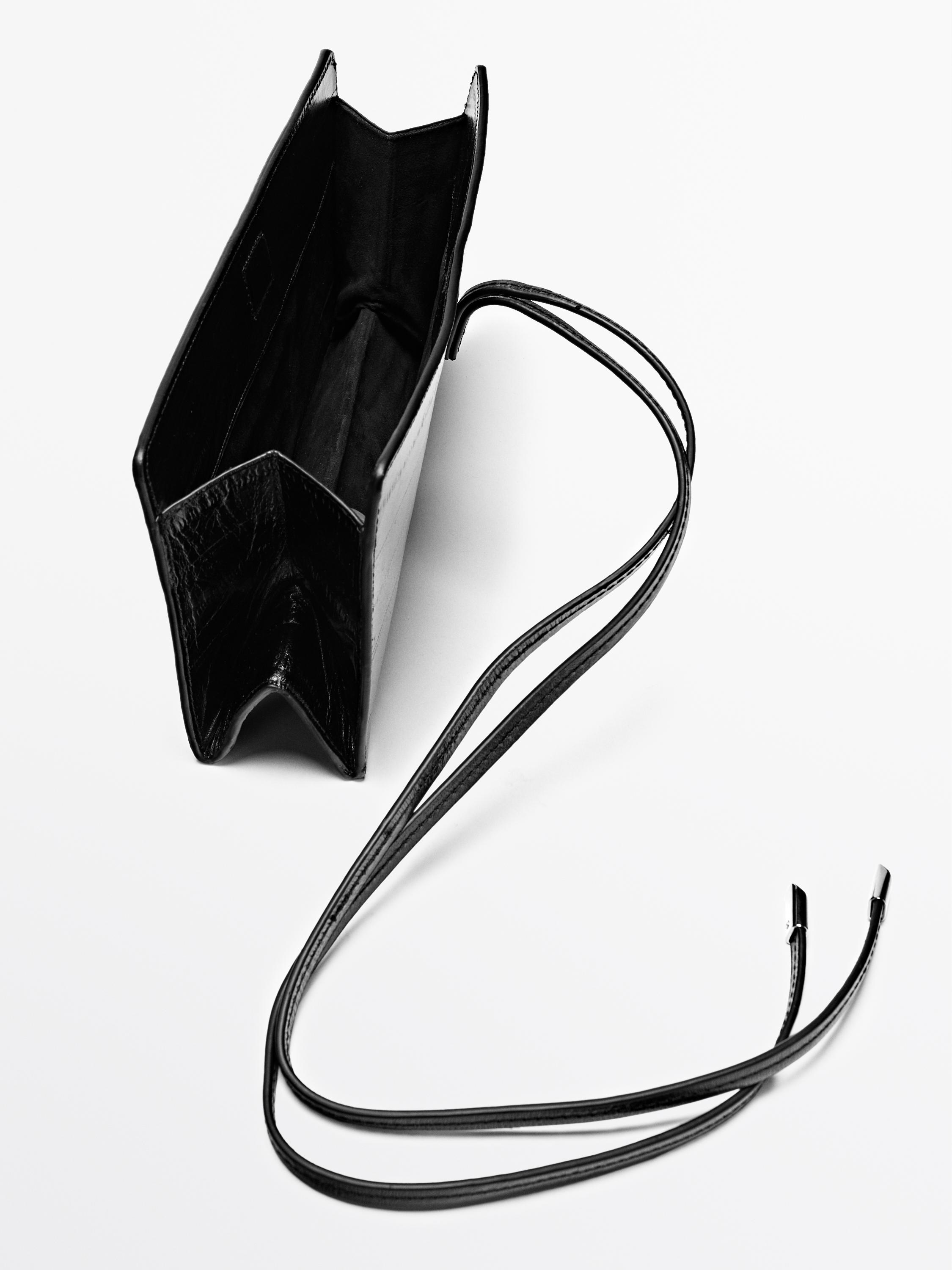 Textured leather handbag