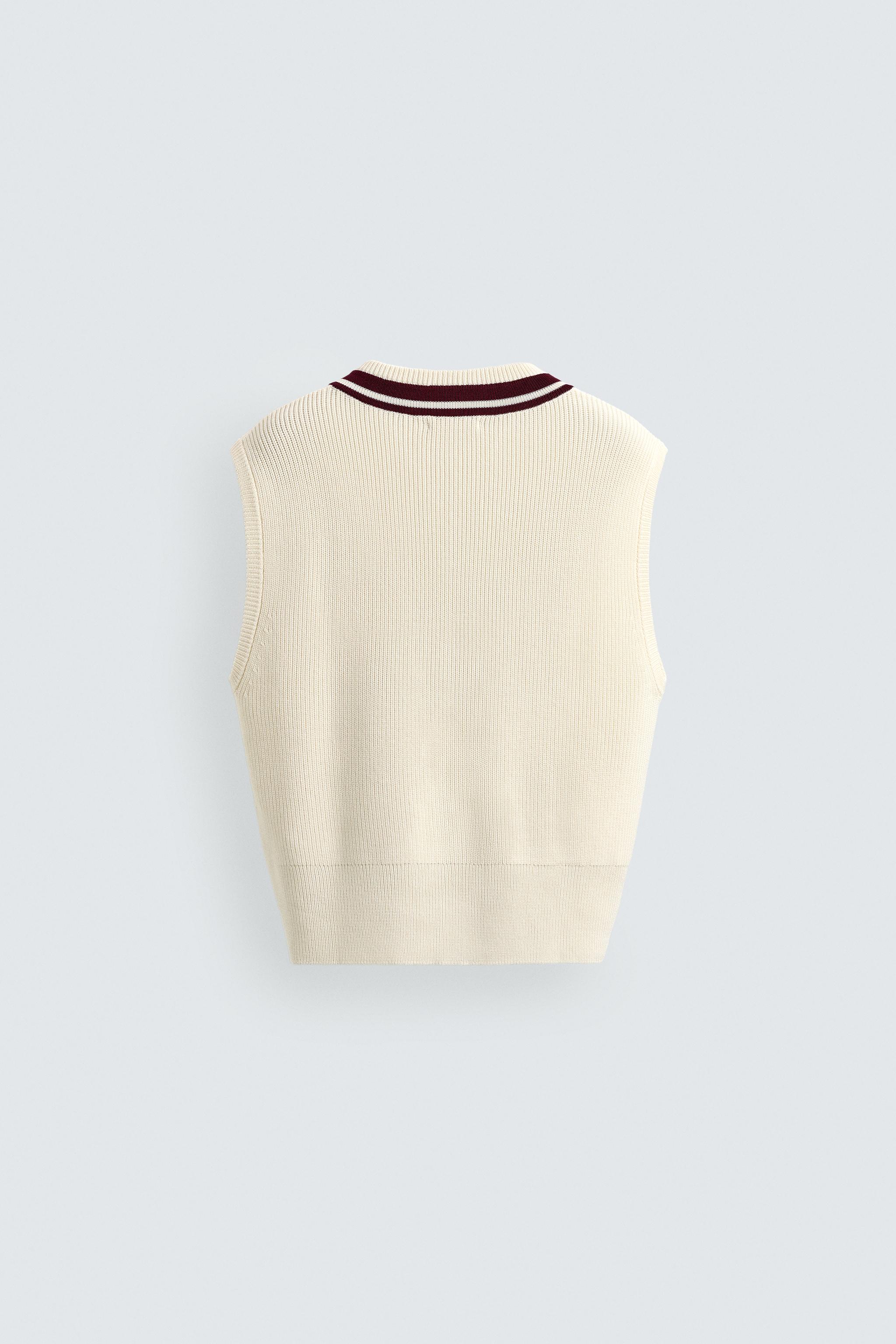 GILET EN MAILLE CÔTELÉ CONTRASTE