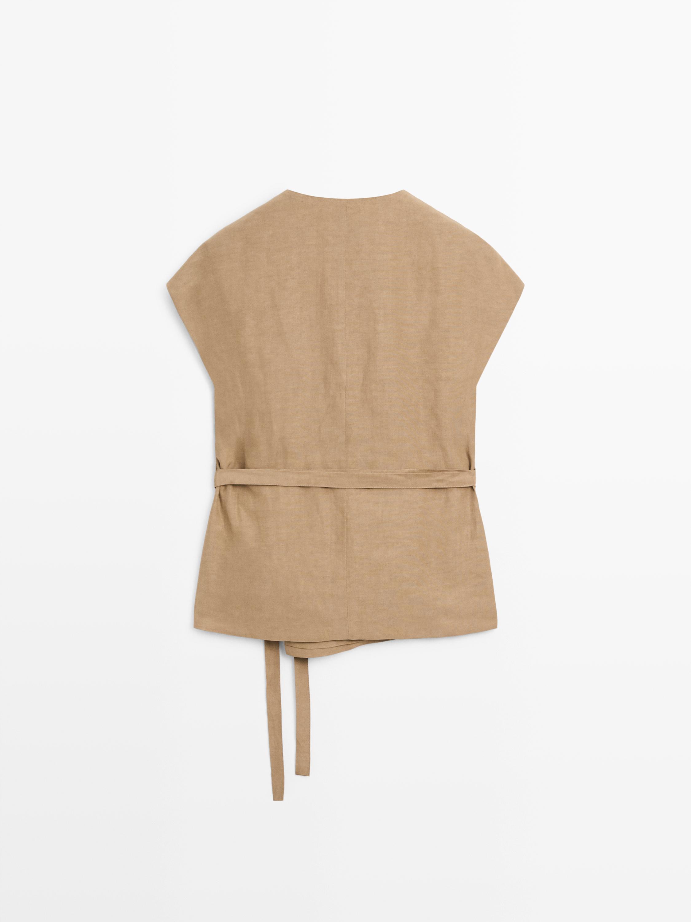 Veste longue cache-cœur sans manches