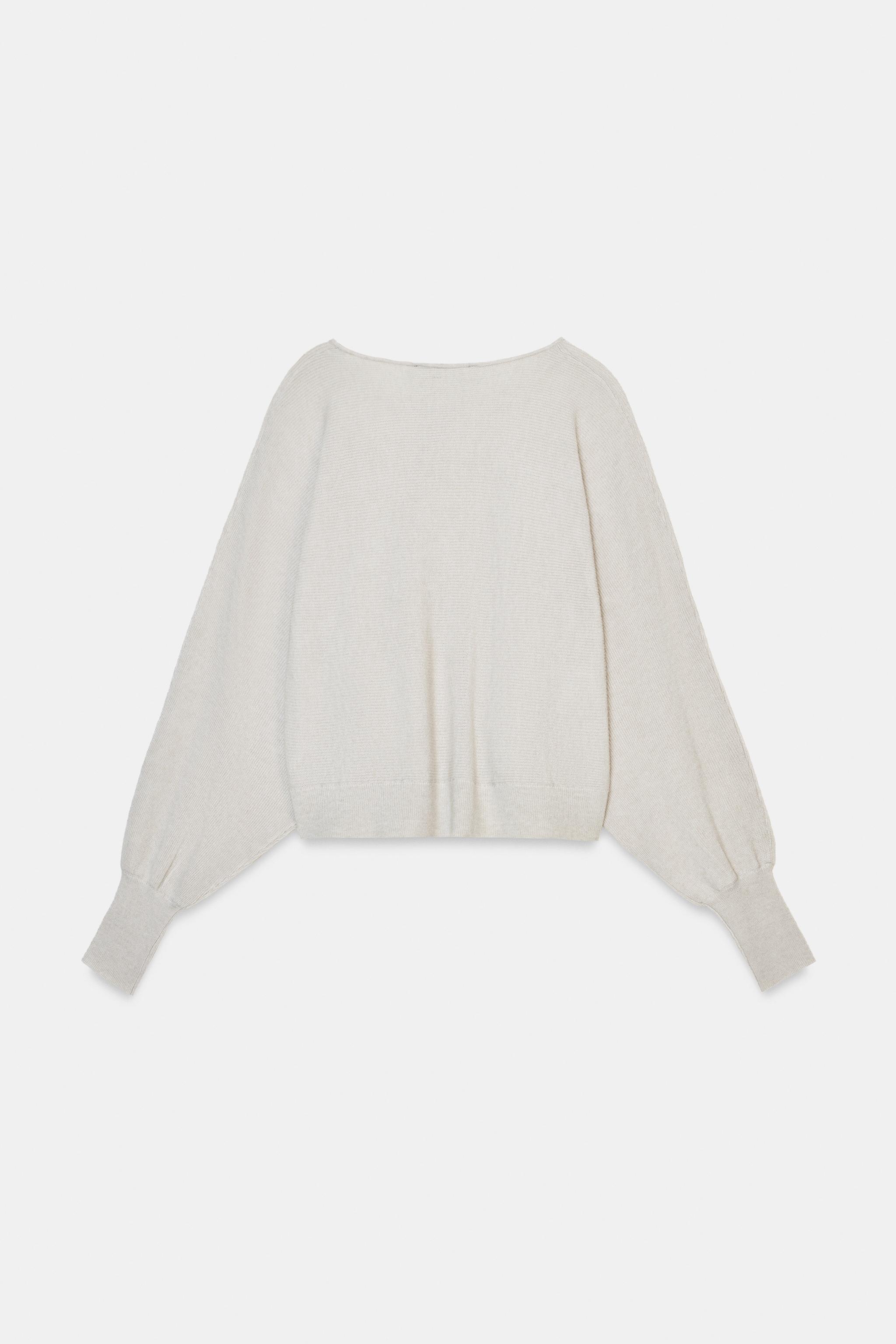 GILET BOUTONNÉ SUR LE CÔTÉ EN MAILLE