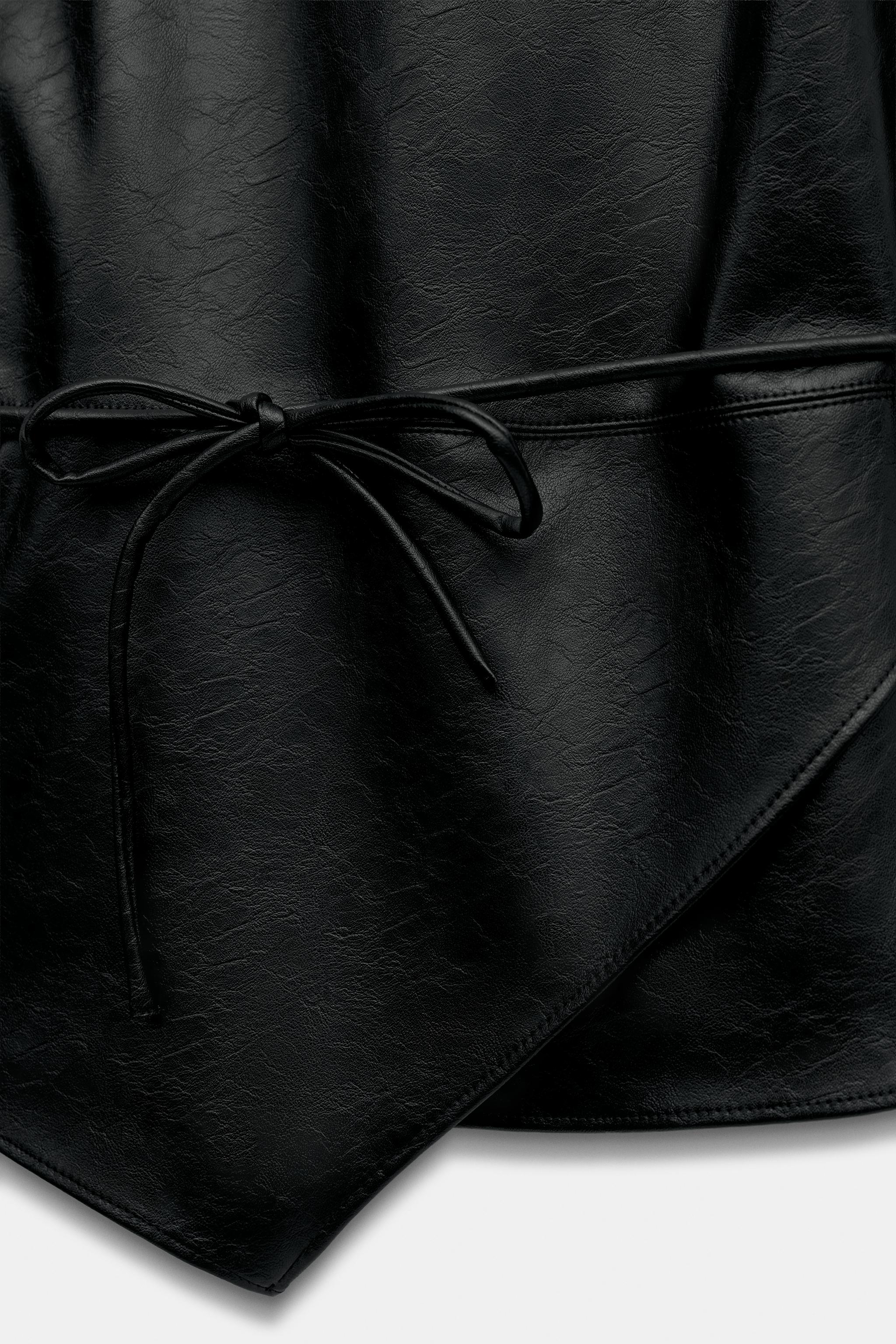 BELTED FAUX LEATHER TOP