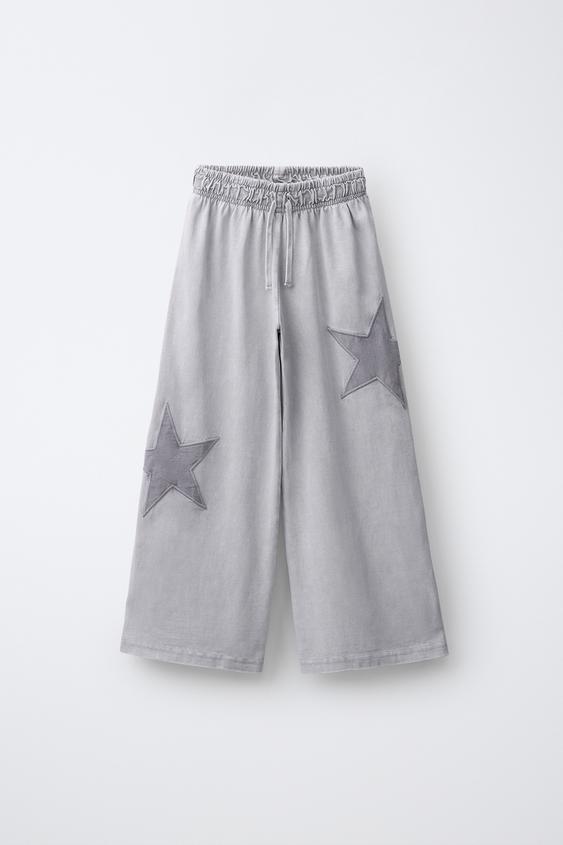 PANTALÓN WIDE LEG EFECTO LAVADO ESTRELLAS - Gris de Zara - Imagen 0