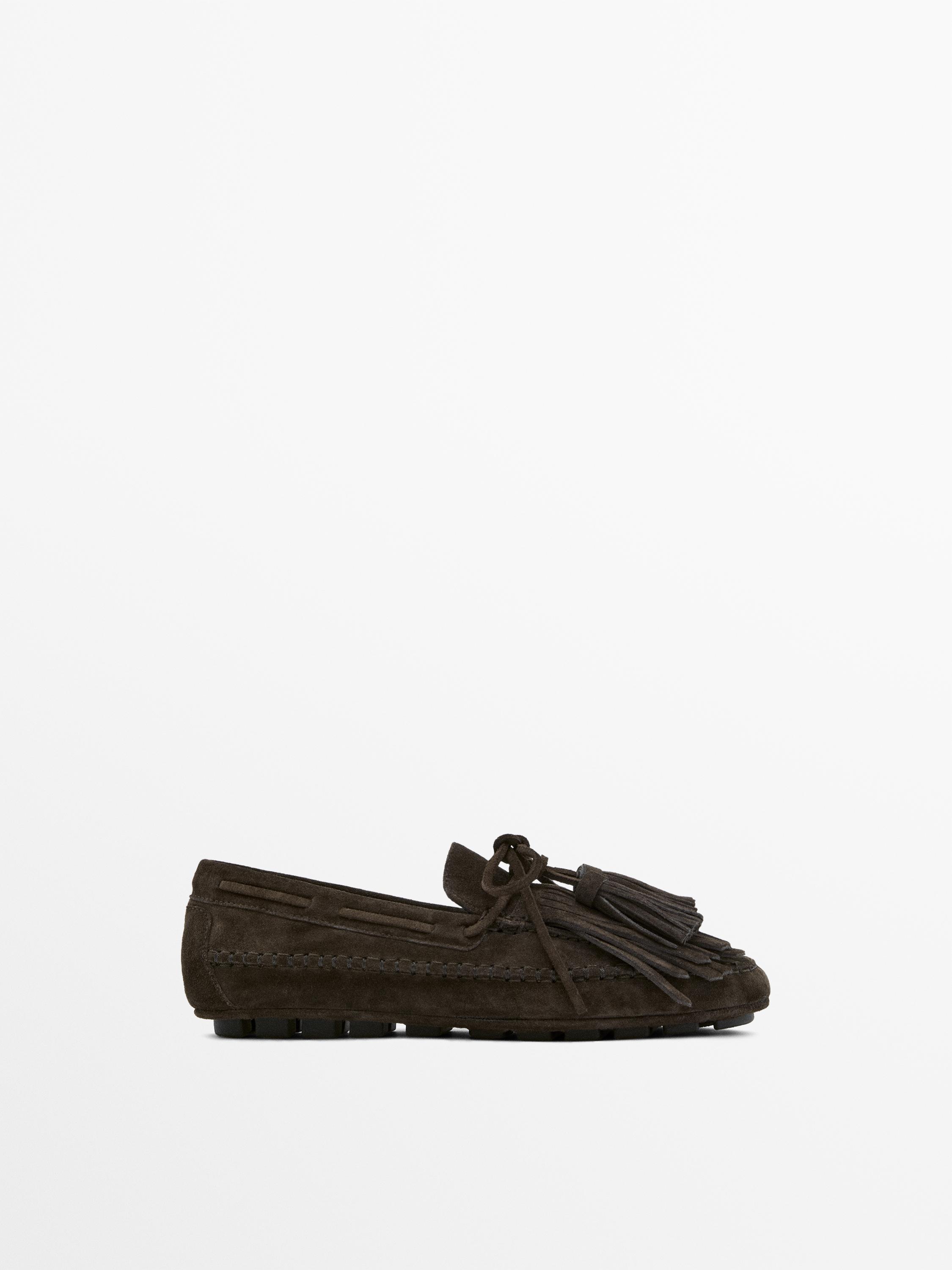Mocassin à franges et pompons en croûte de cuir