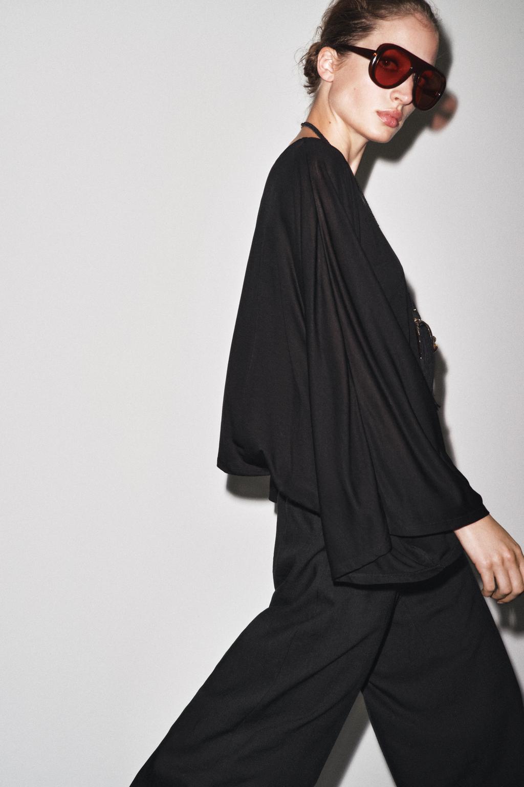 ASYMMETRIC FLOWY CAPE