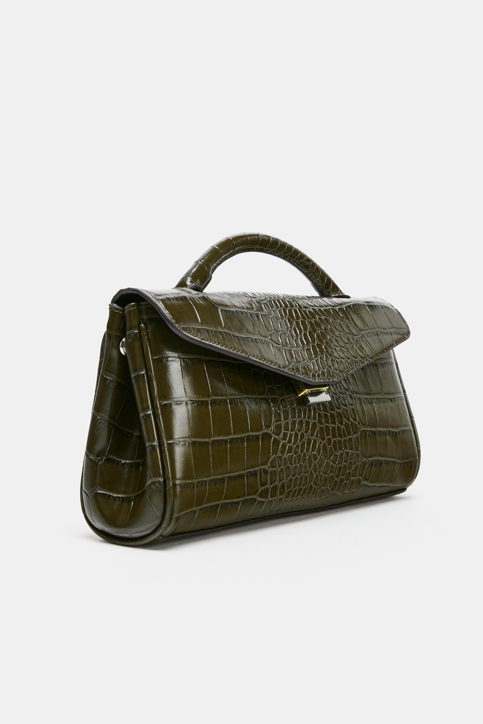 EMBOSSED HANDBAG