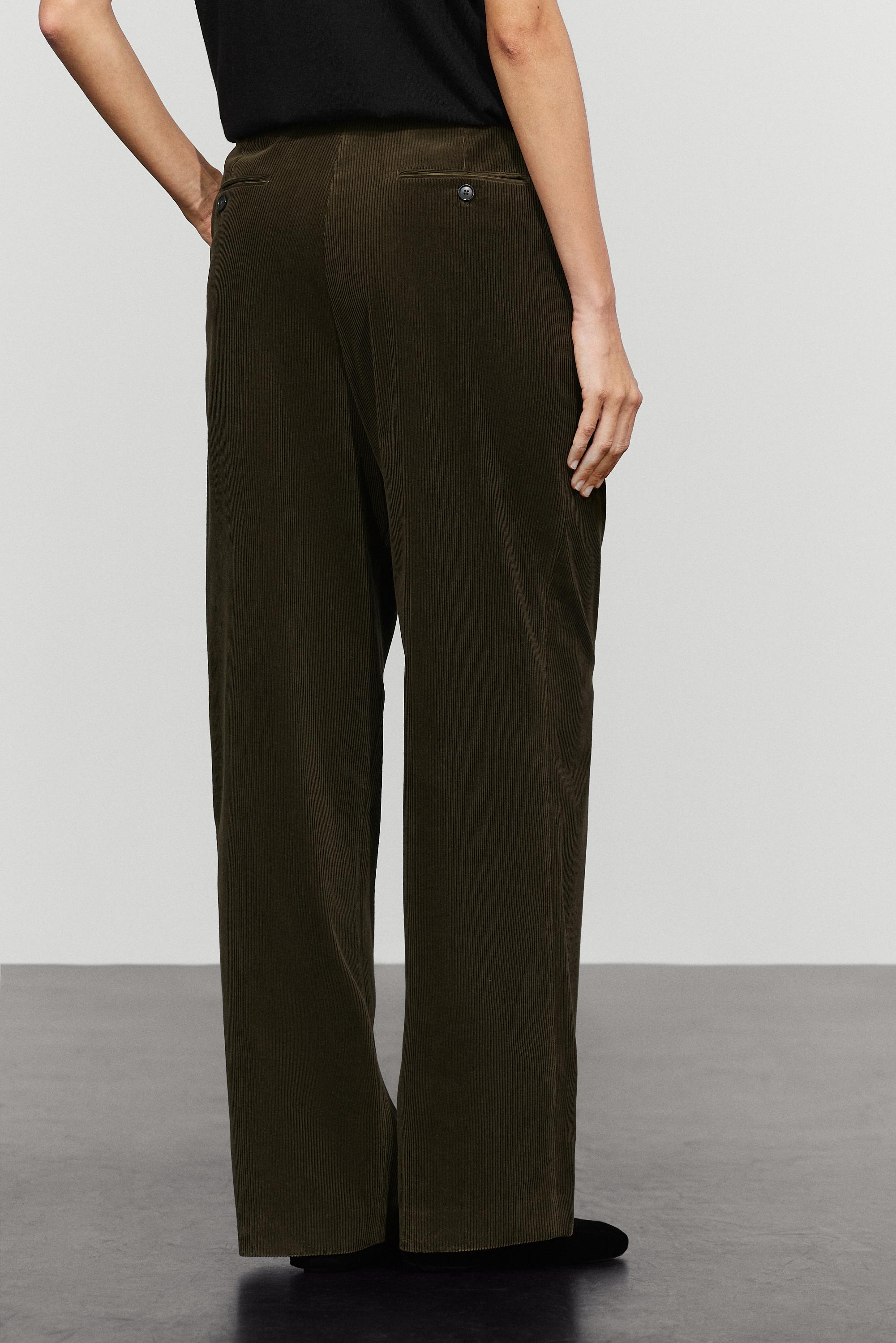 Pantalon large à pinces en velours côtelé