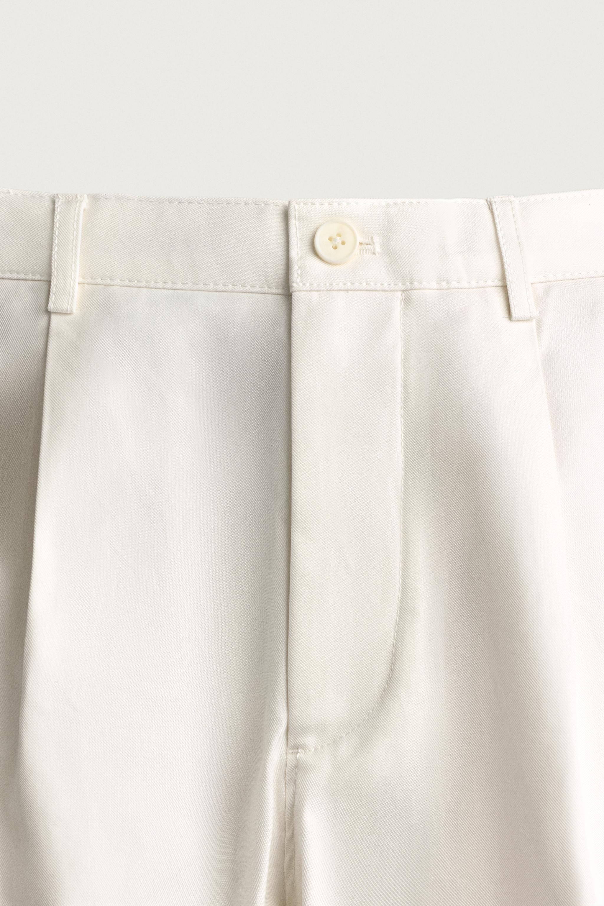 STRAIGHT FIT PLEATED PANTS