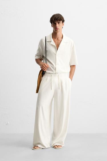 RELAXED FIT TEXTURED TROUSERS - White by Zara