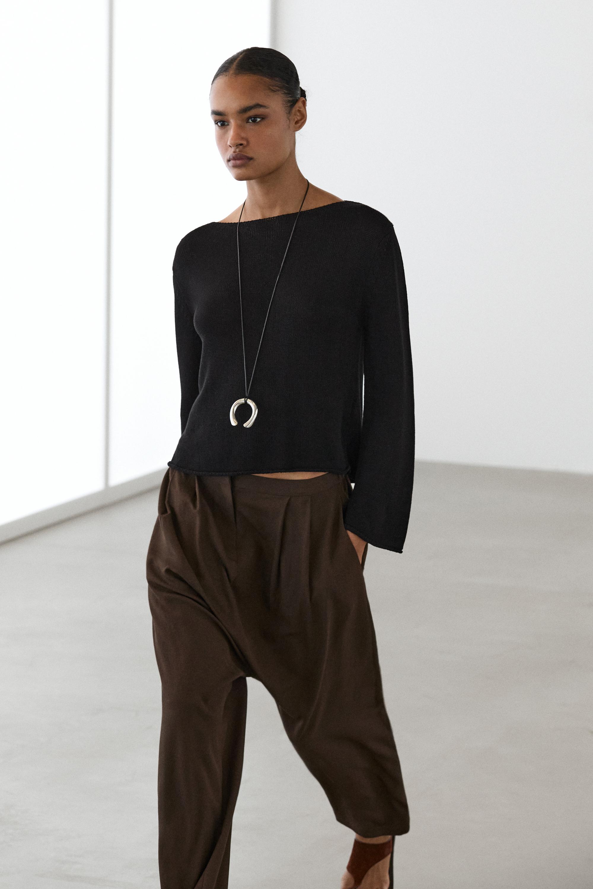 Flowing knit boat neck sweater