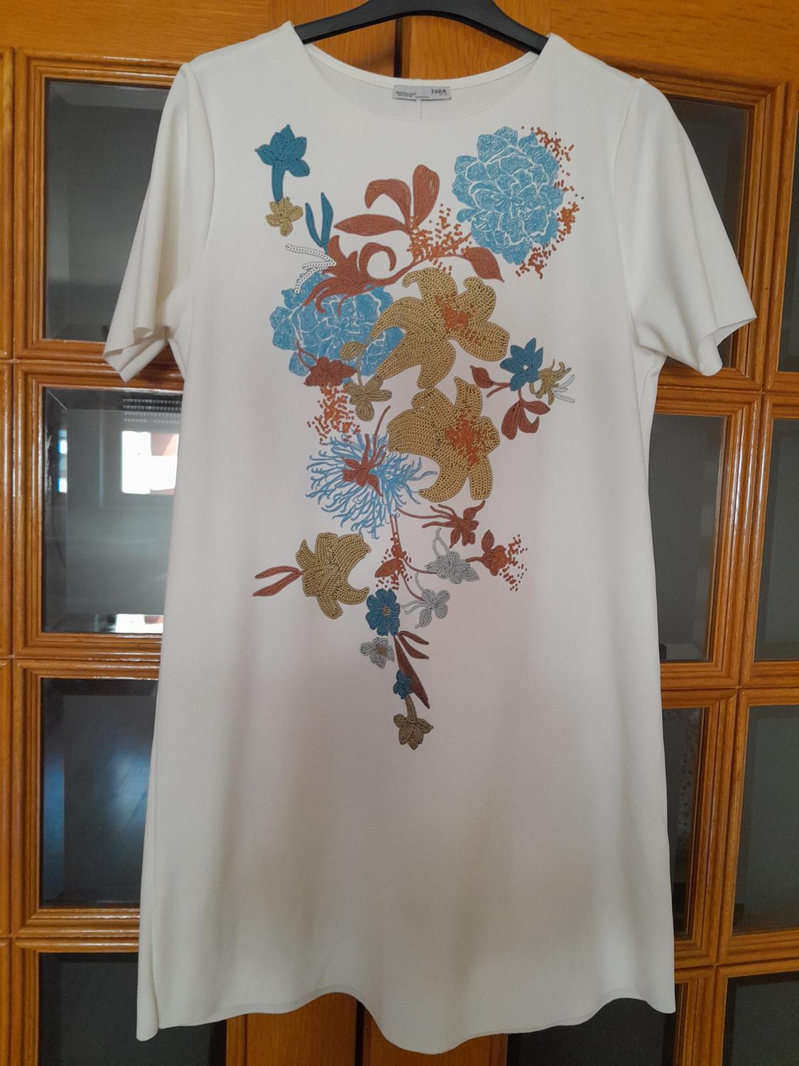 DRESS WITH RUBBERIZED FLORAL PRINT