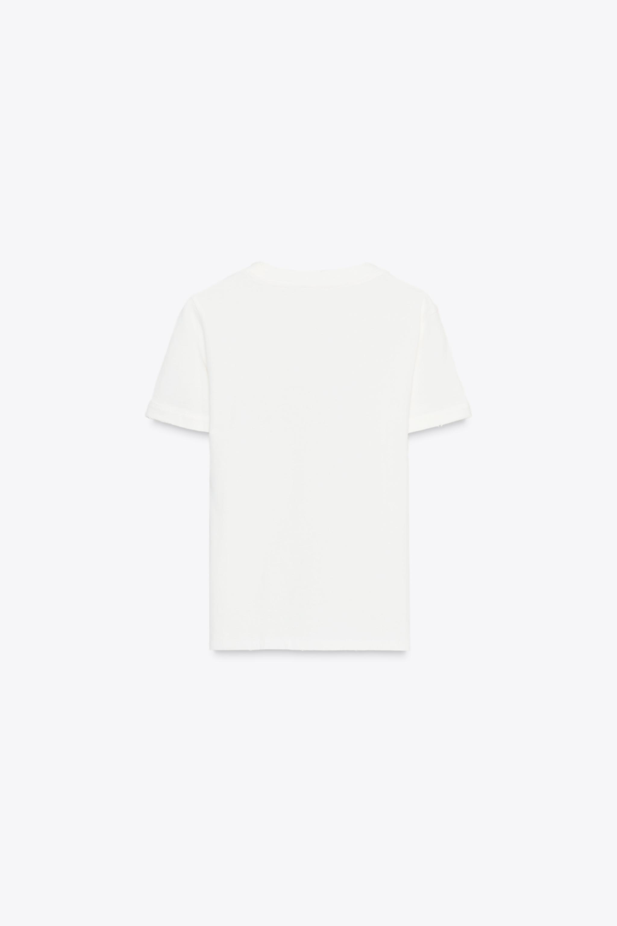 T-SHIRT EN COTON TEXTE DÉCHIRURES