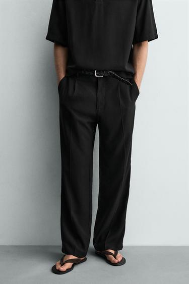 PANTALÓN FLUIDO RELAXED FIT PLIEGUES - Negro de Zara