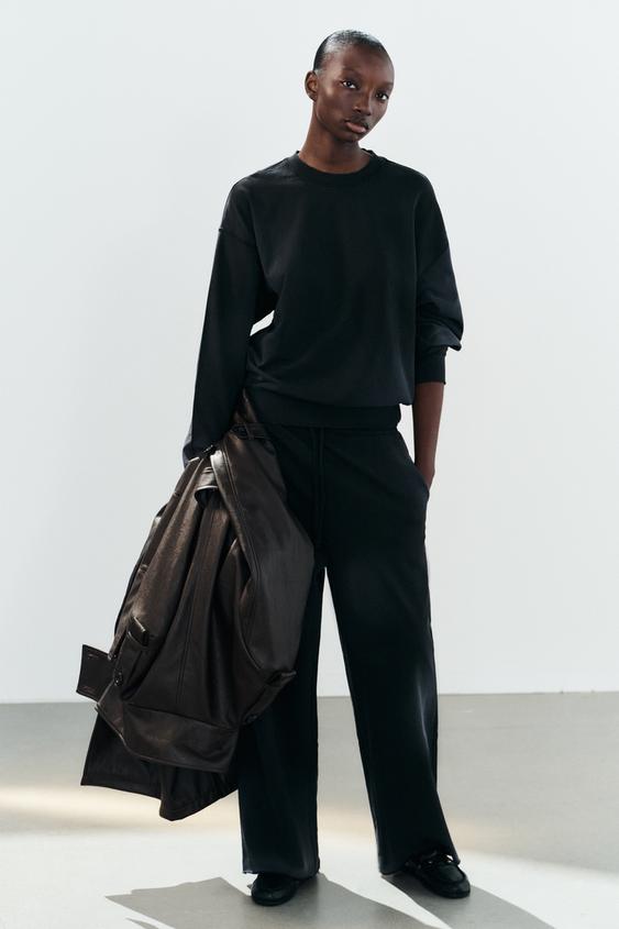 PANTALÓN FELFA EFECTO LAVADO - Negro de Zara - Imagen 0