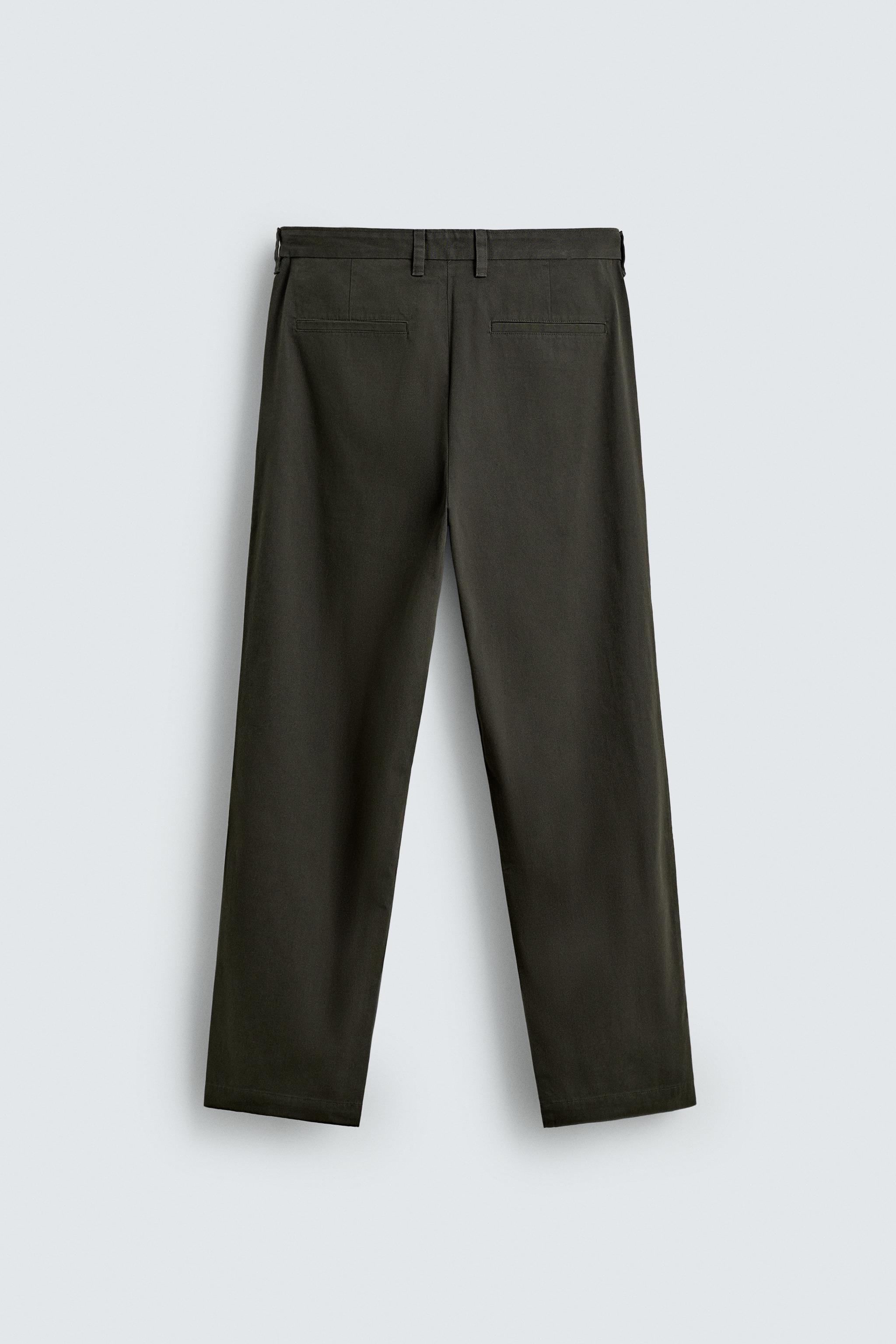 REGULAR FIT PLEATED PANTS