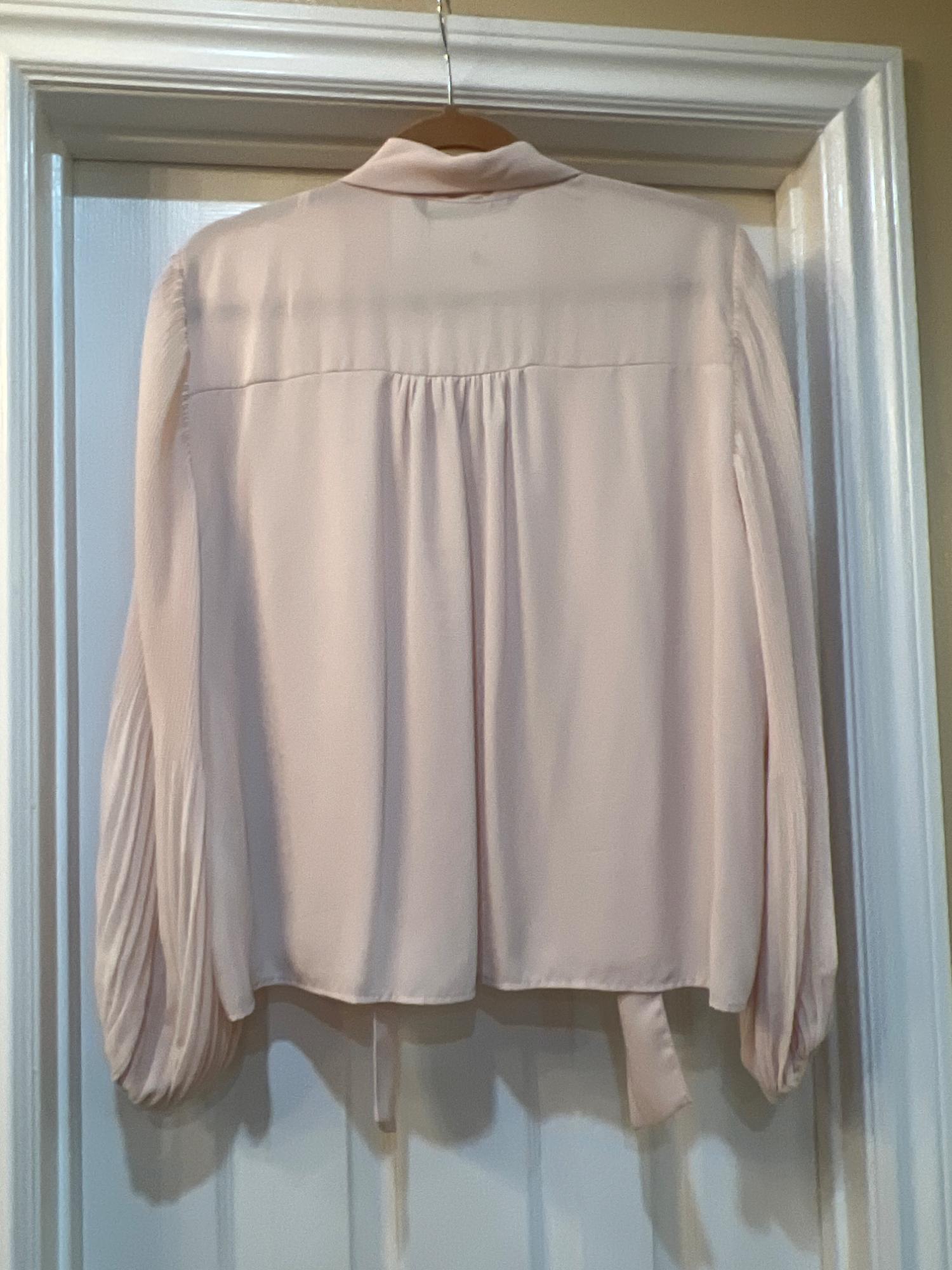 PLEATED BLOUSE WITH BOW