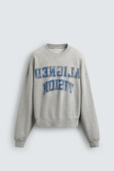 Zara SWEATER MAJICA S VARSITY PRINTOM – sivi lapor