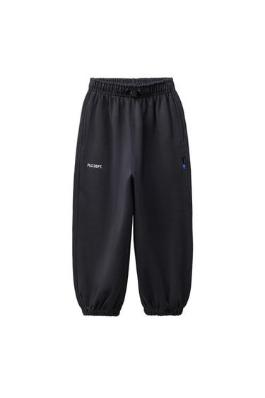 بنطلون صوف الخروف بقصة بالون وكتابة - رمادي أنثراسايت by Zara