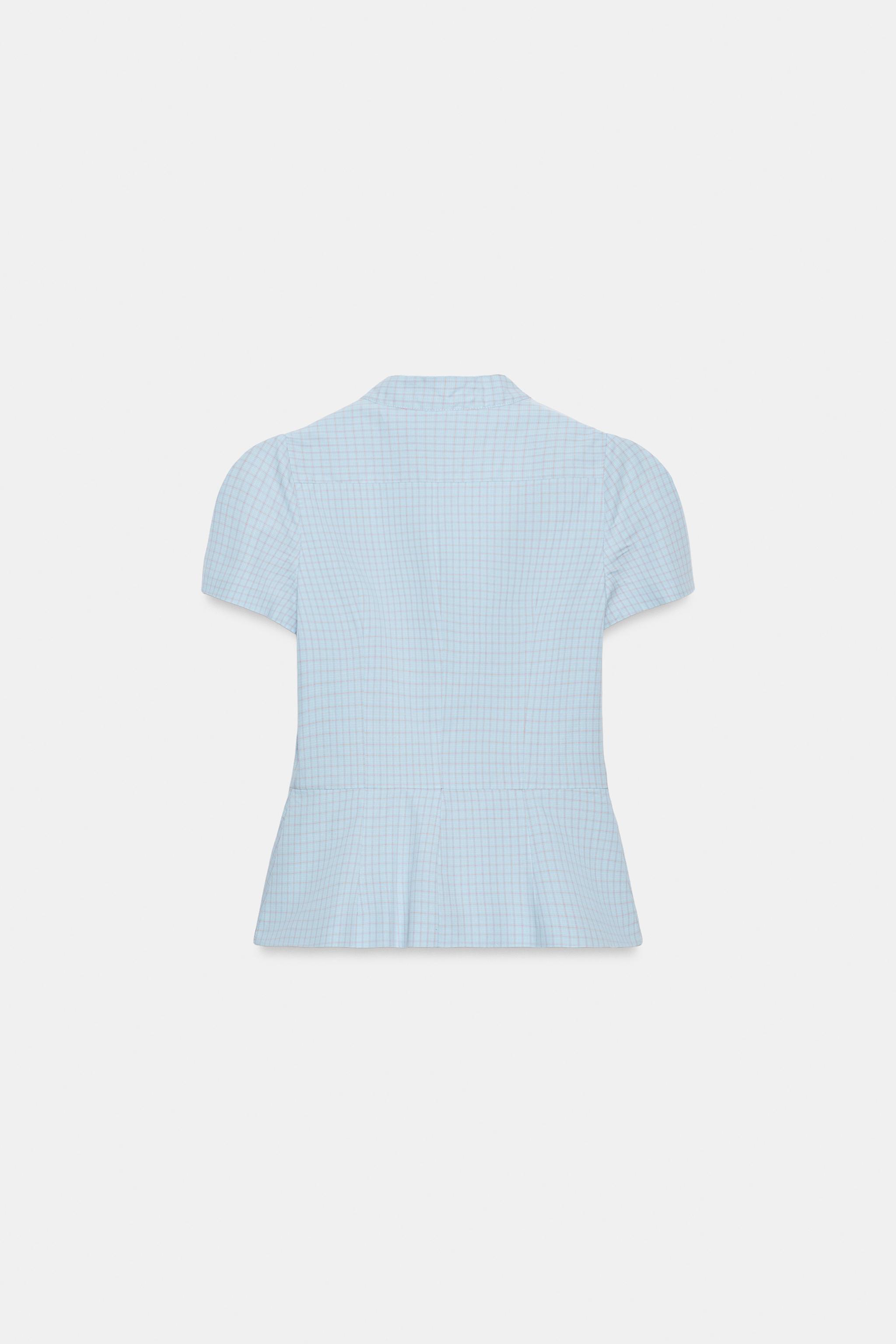 CHECKED PEPLUM TOP