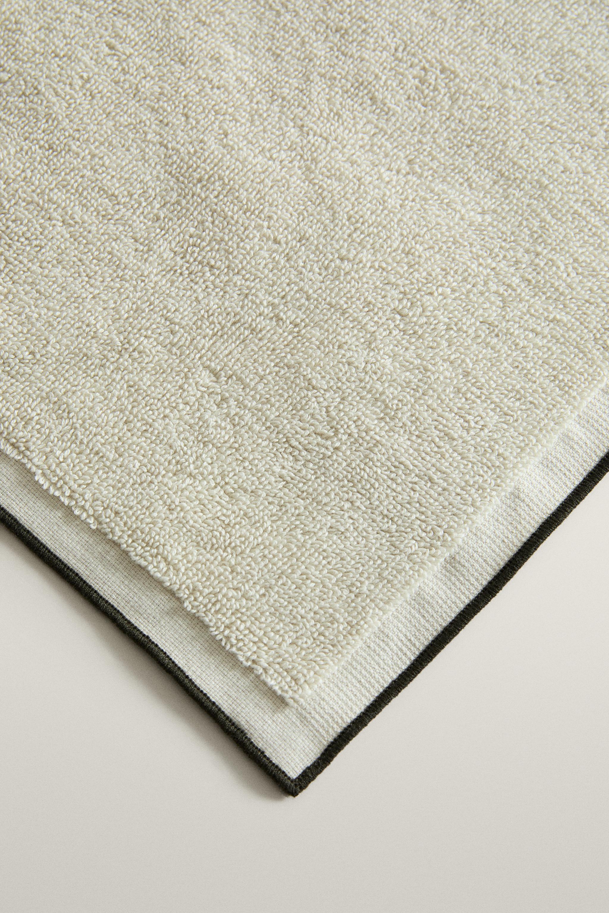 SERVIETTE DE BAIN COTON SURPIQÛRES ET PASSEPOIL
