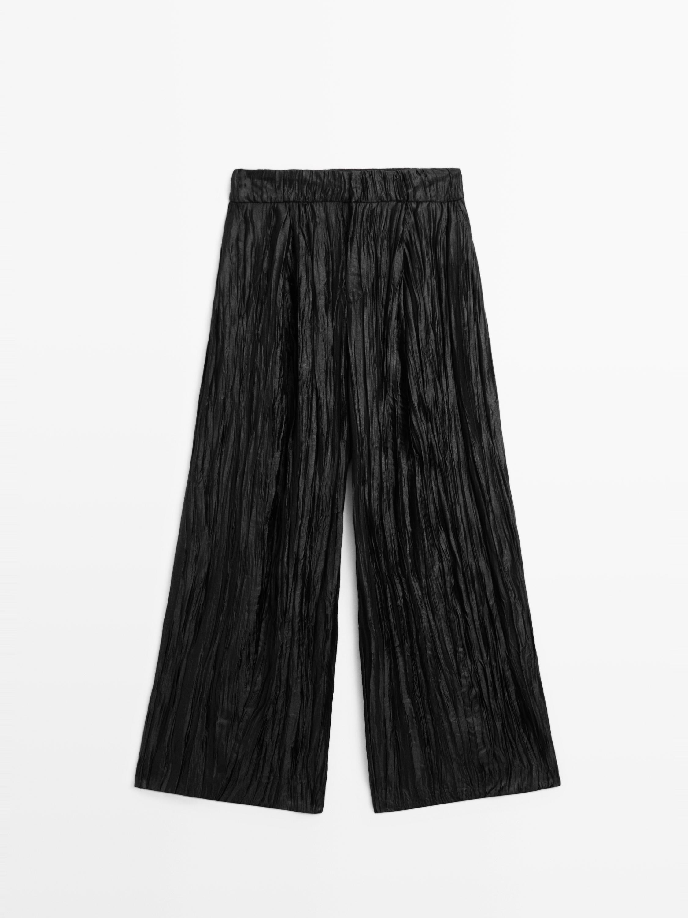 Creased pleated-effect wide-leg trousers