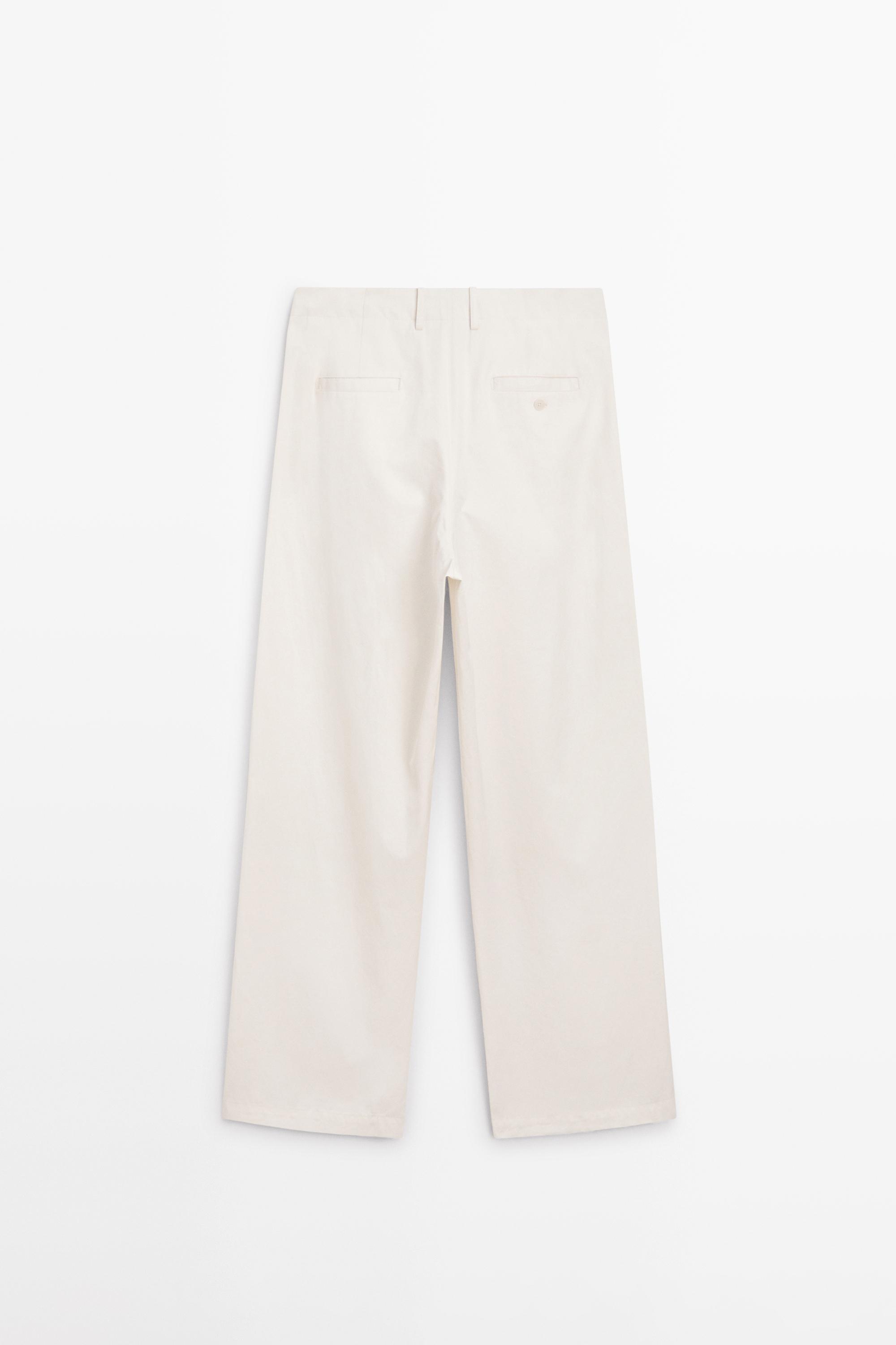 Pleated pants with crossover fastening detail - STUDIO