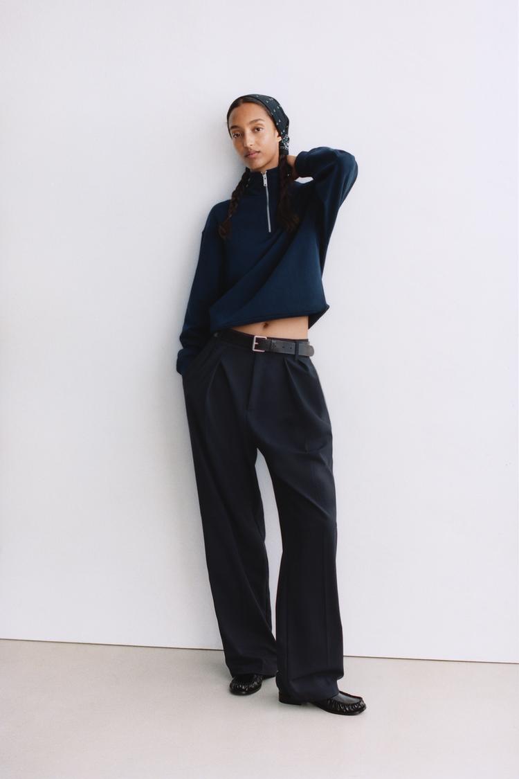 VOLUMINOUS PLEATED TROUSERS